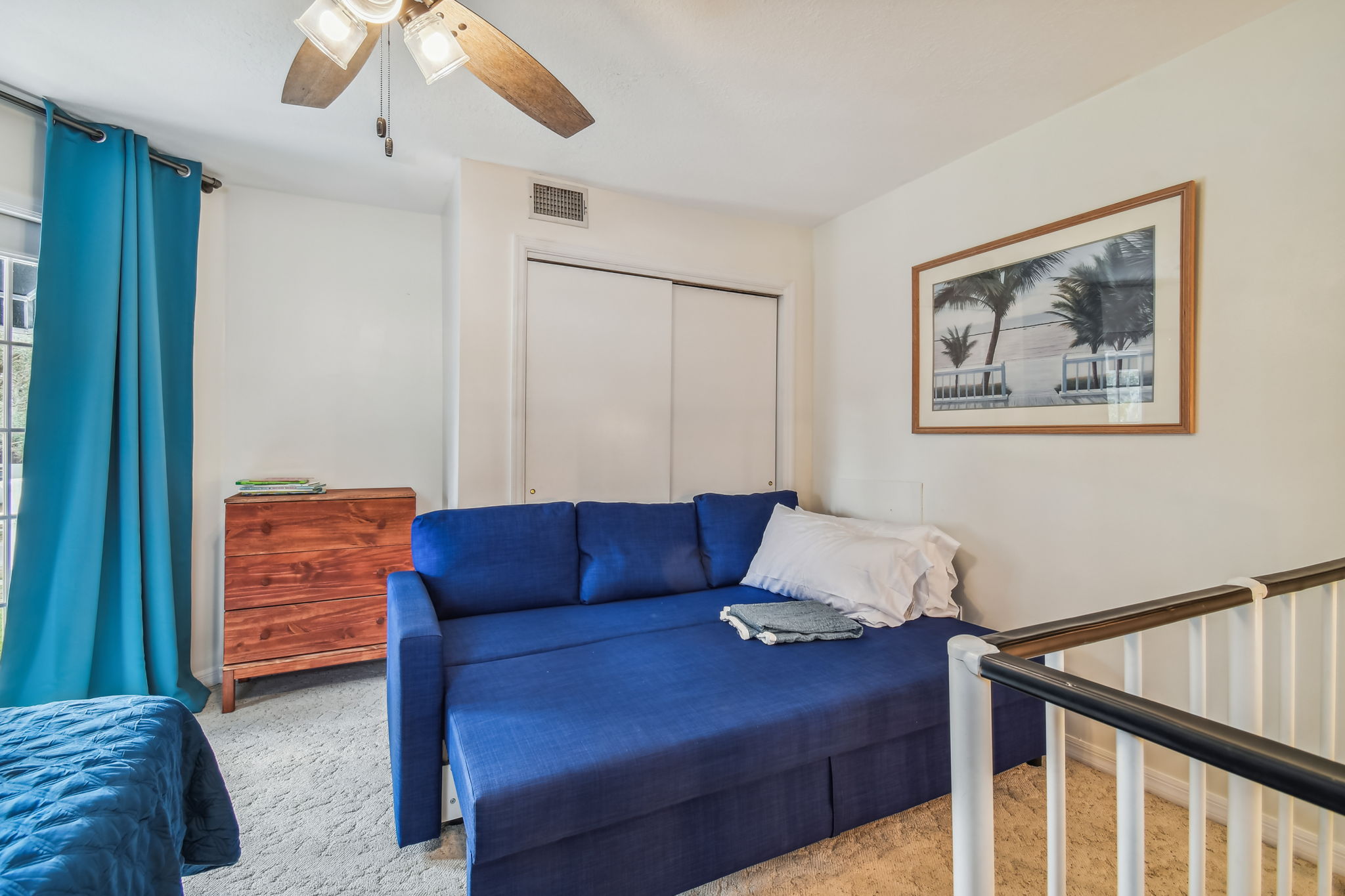 The kids' loft includes a fold out couch in addition to the two twin beds.
