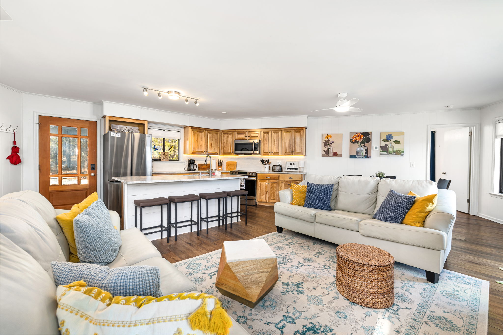 Living Room: Bright and airy space perfect for relaxation and gatherings with loved ones!