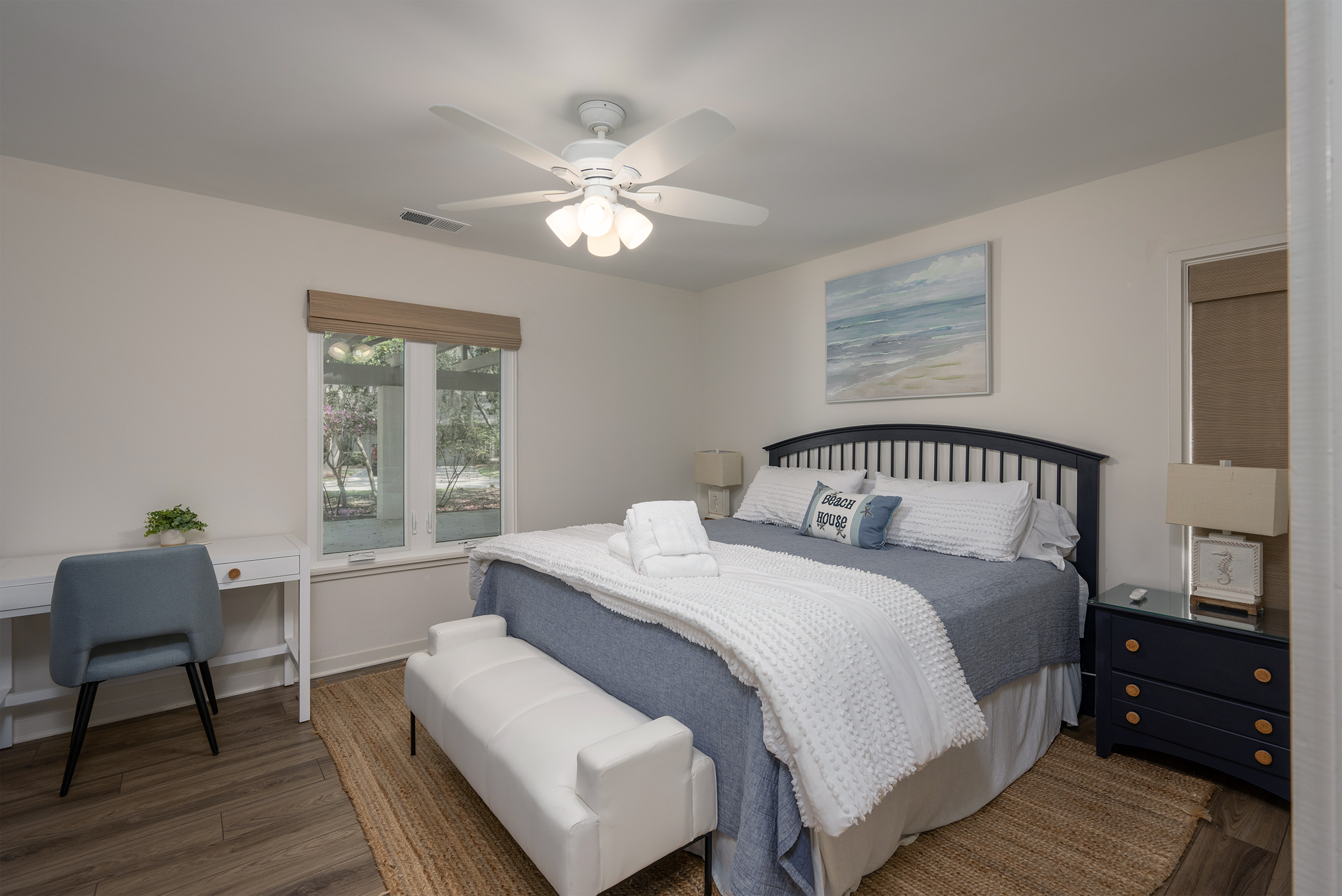 Second king bedroom features workspace