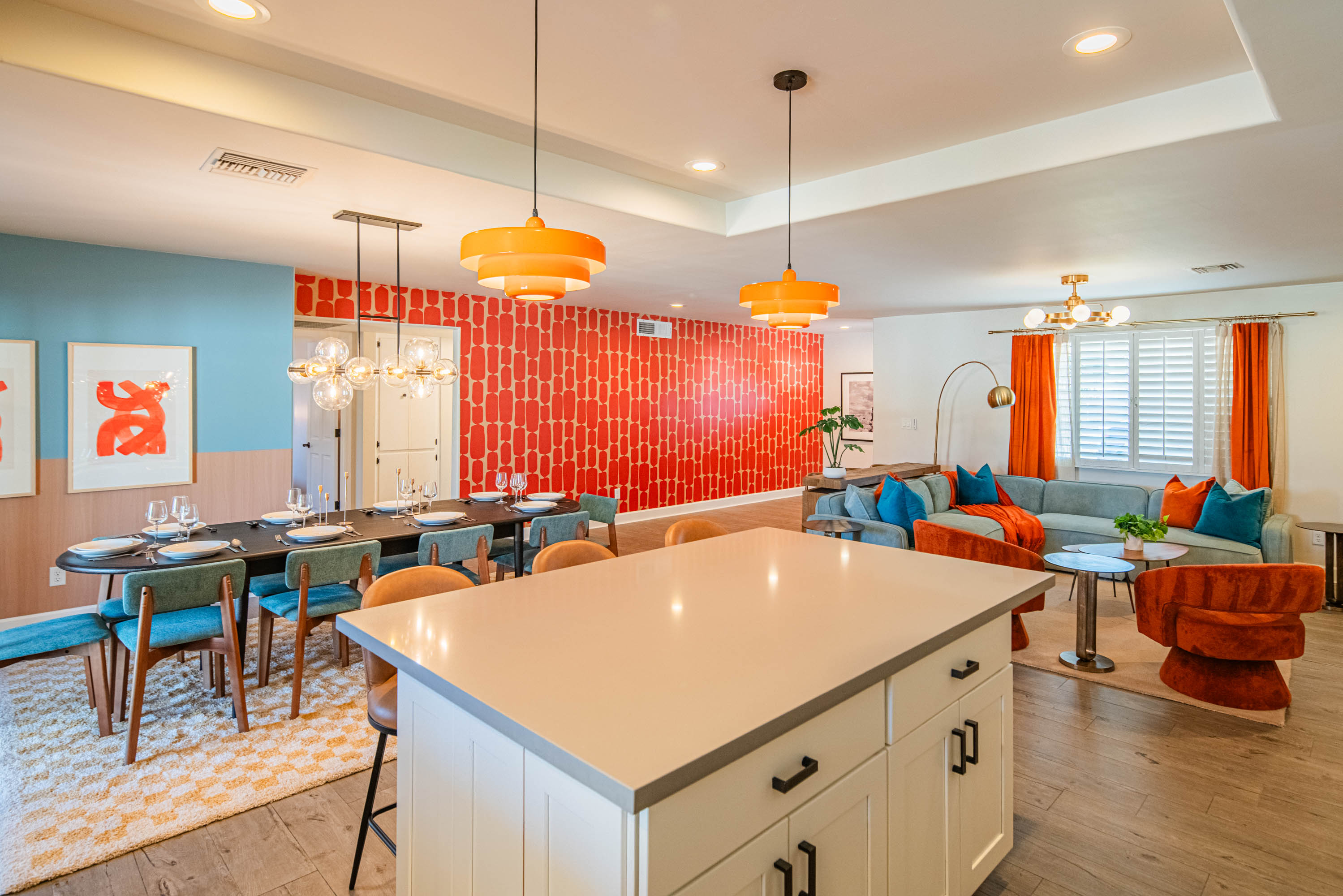 Expansive dining table and oversized kitchen island provide ample seating for shared meals, game nights, or hosting groups with ease.