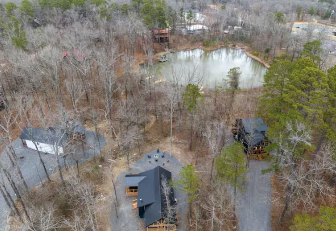 Bird’s-eye view of the cabin and nearby pond
