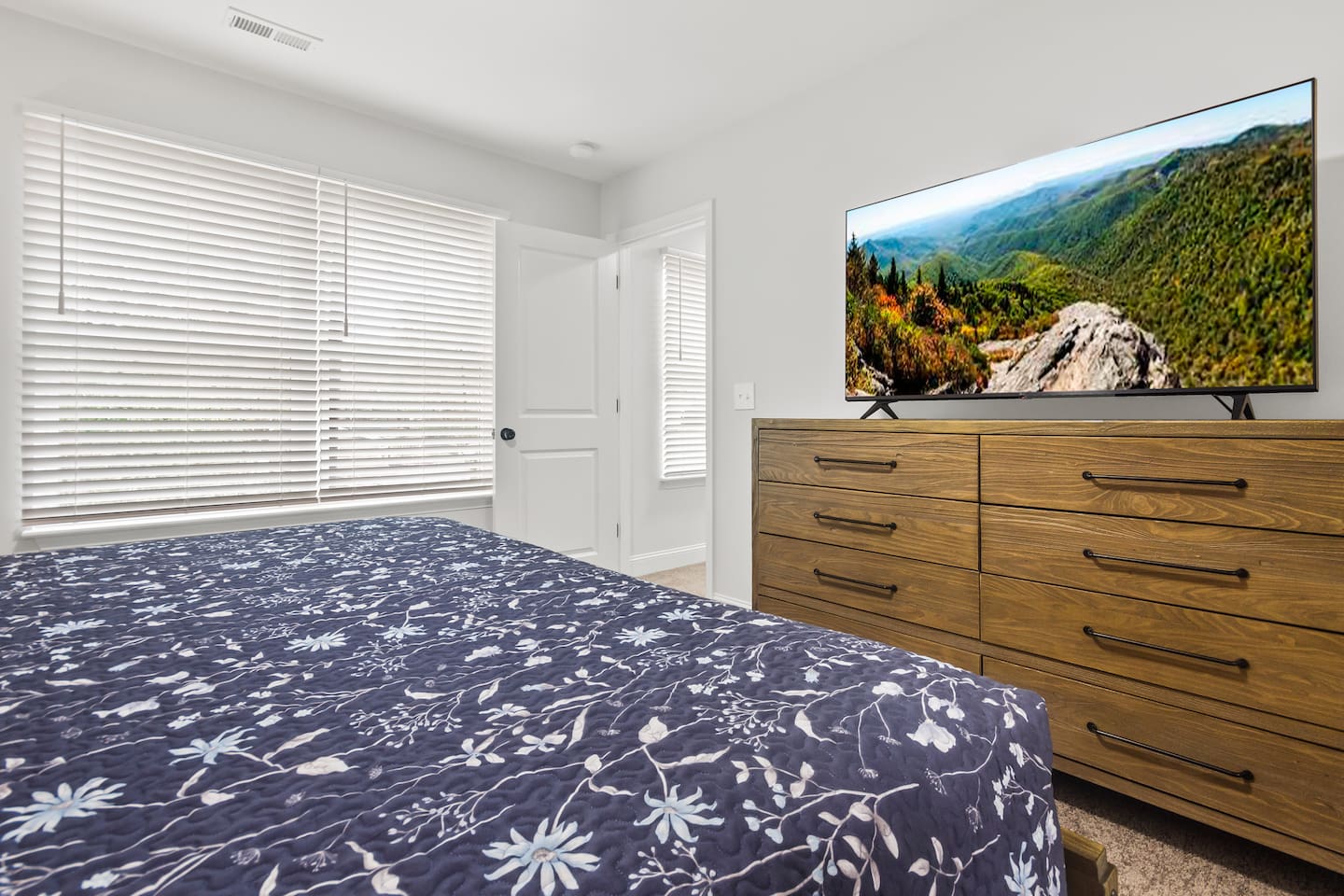 King bedroom with TV