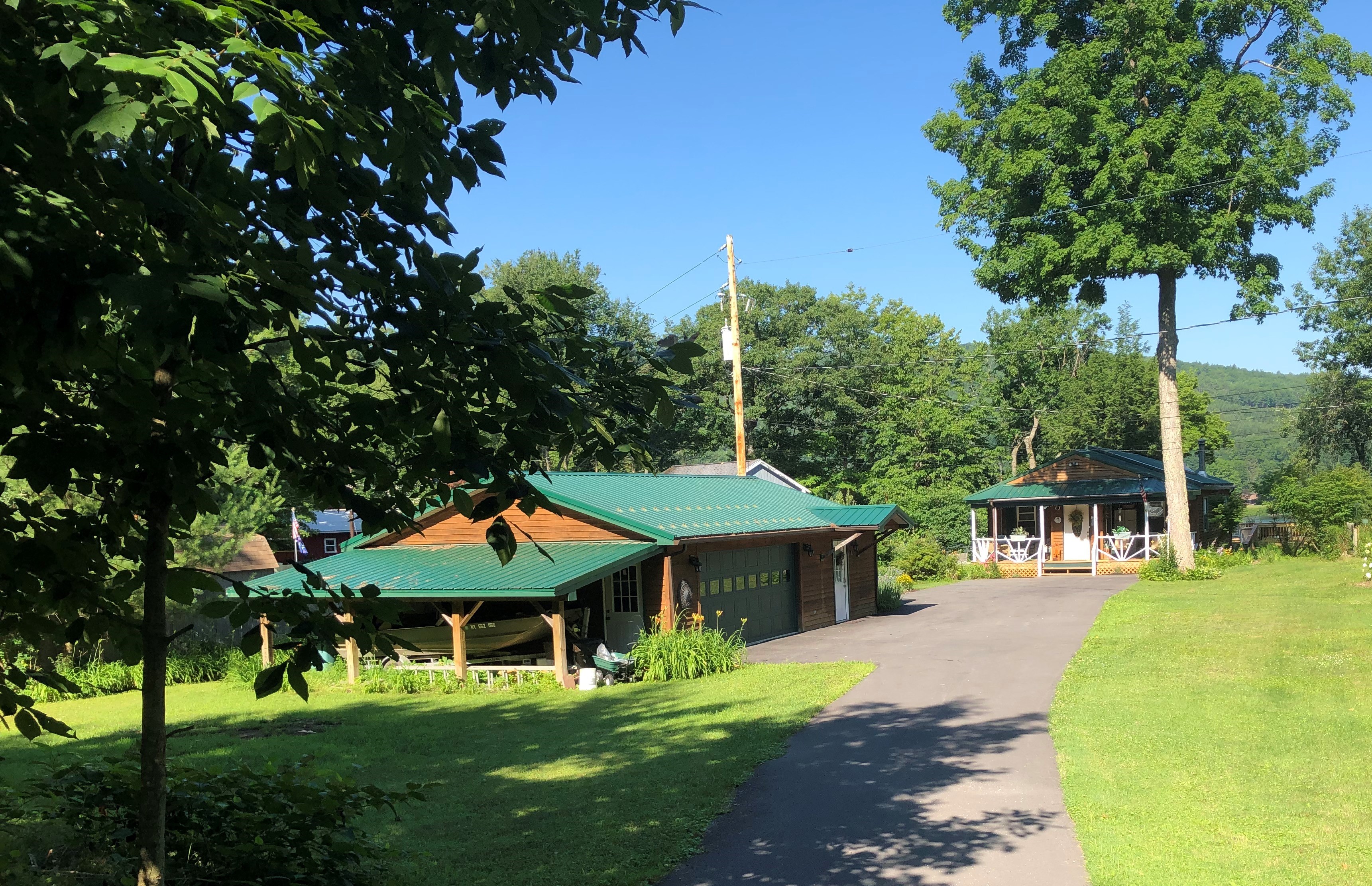 Lakeside Suite exterior. Lakeside suite is attached to the garage on the left. The main house to the right is occupied by your host.