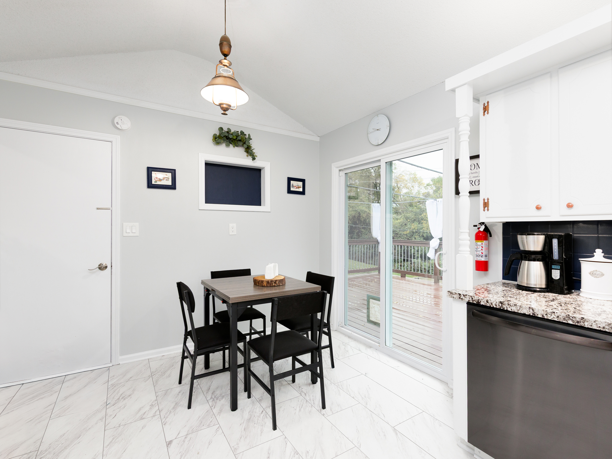 Bright eat-in dining area with a versatile table that extends to seat six comfortably—perfect for shared meals and connection.