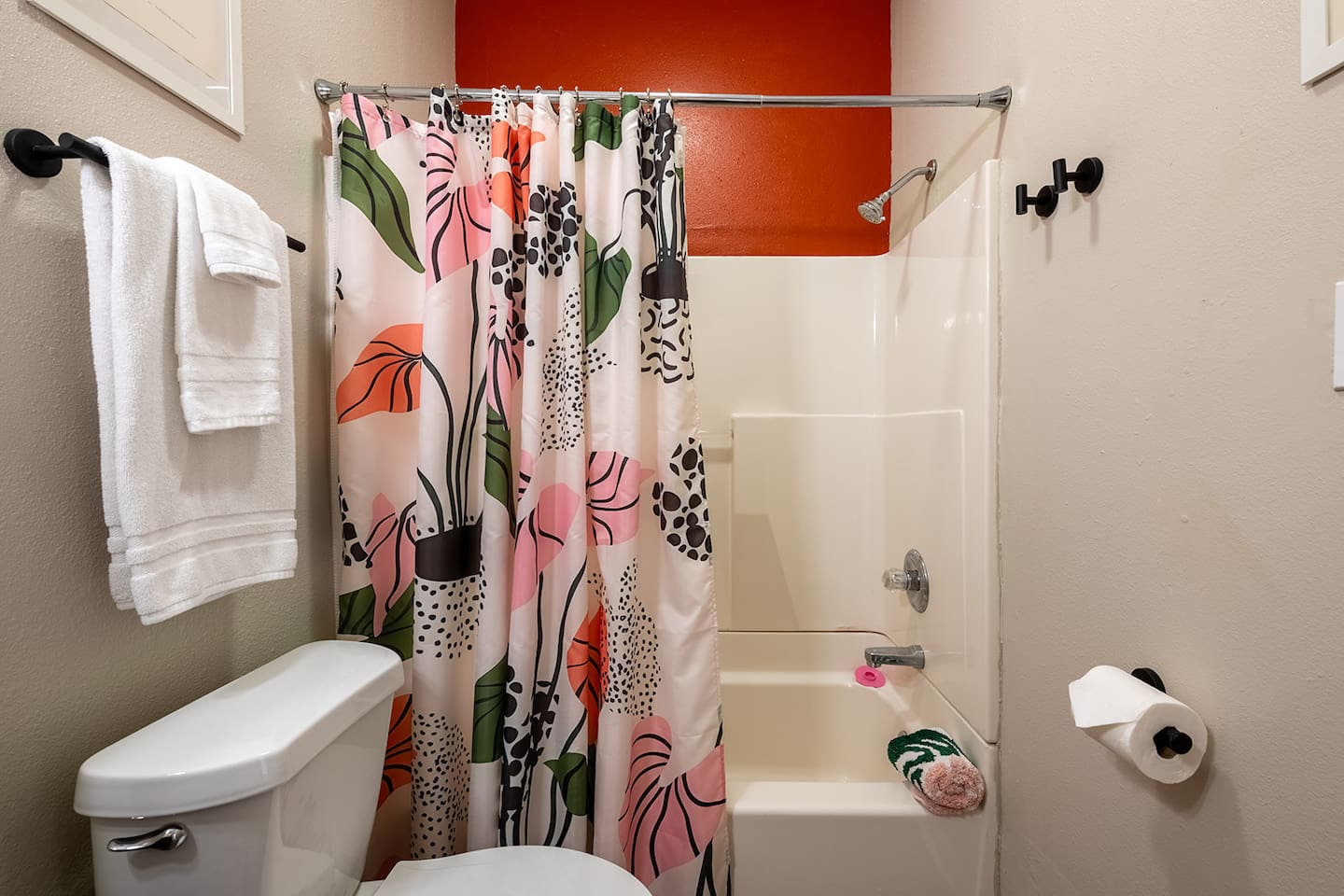 Your upstairs full hallway bathroom is accessible to all and boasts wallpaper and modern accents.  Plenty of towels, soap, shampoo, conditioner.