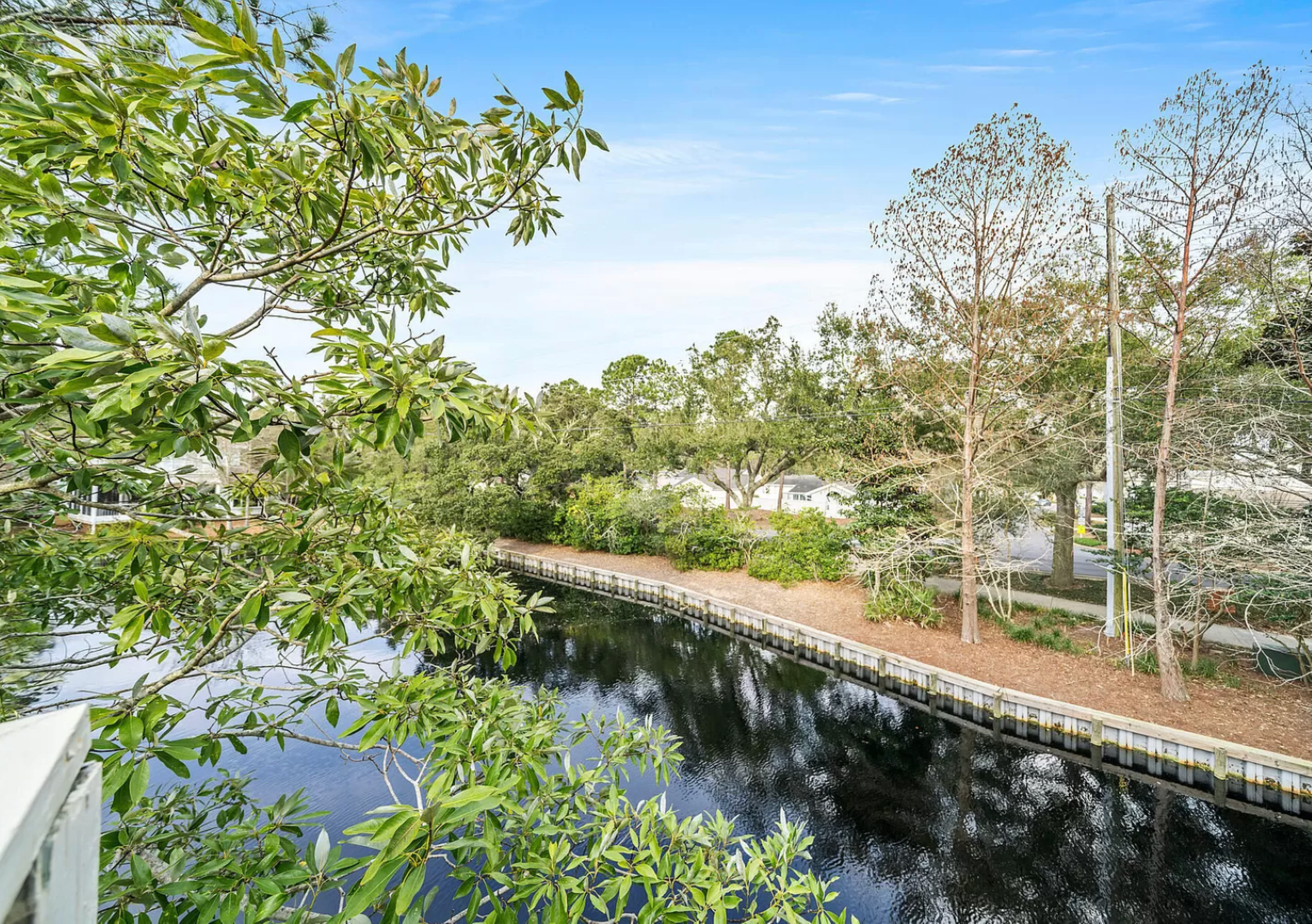 One of the beautiful views of the Sandestin Resort. Marked by beautiful vegetation and a winding canal bordered by a wooden walkway.