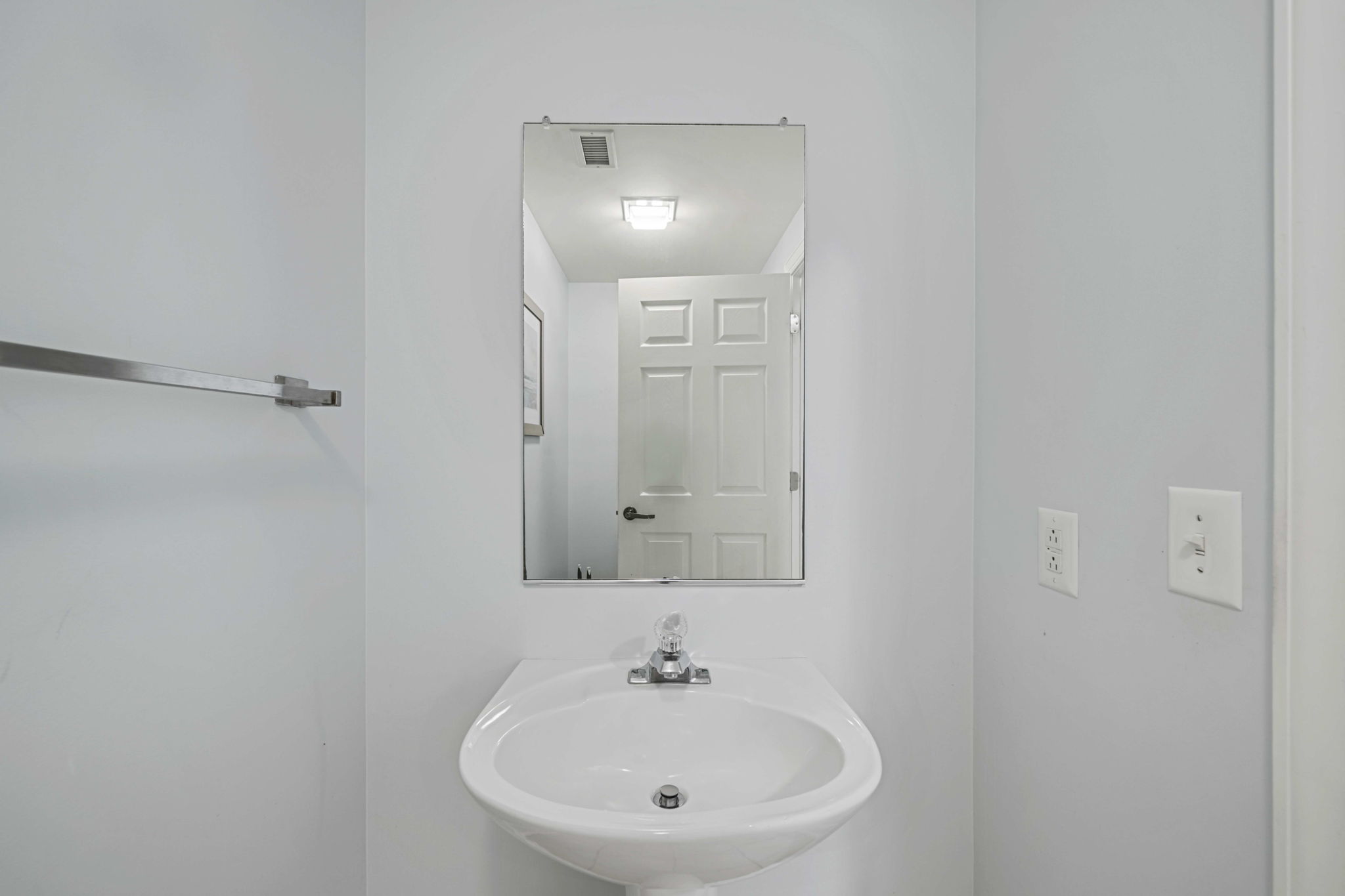 Bathroom 3: Hallway half bath | Sea Gull | 201 Oceanview | 1116 Ocean Blvd, Isle of Palms, SC | IOP Escapes