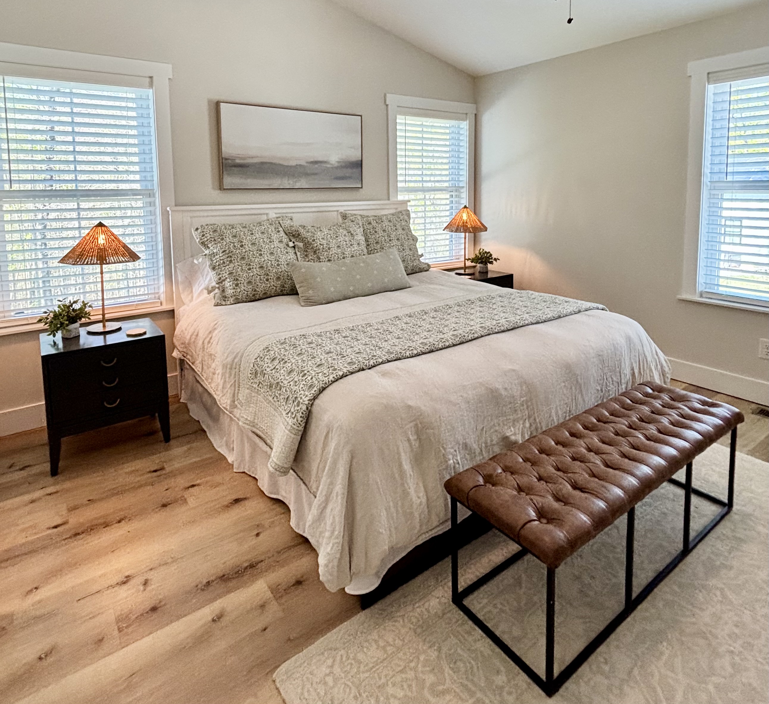 Sleep in luxury: the primary bedrooms boasts ensuite bathroom's and features a King-sized Zinus Green Tea mattress's and Organic Supima Cotton Linens, ensuring a restful and comfortable night's sleep.