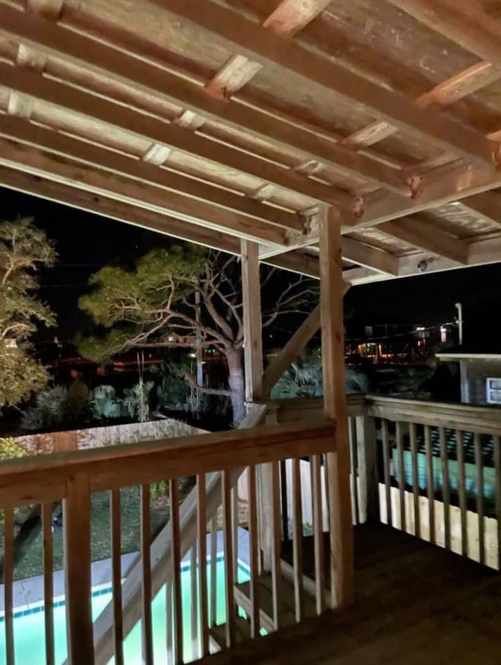 Deck with a View: Enjoy starlit evenings overlooking the pool and lush surroundings!