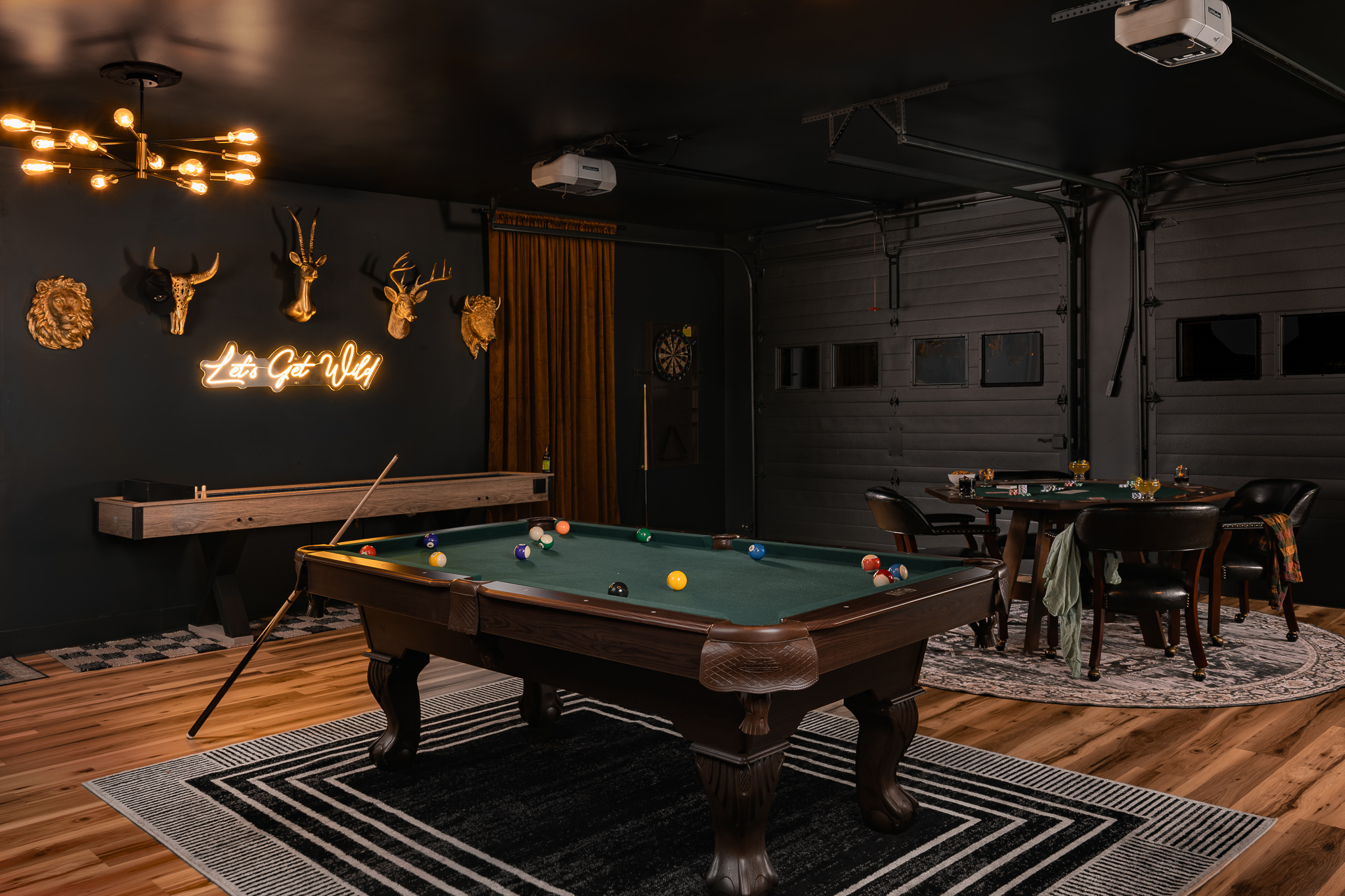{Speakeasy Game Room} Pool, poker, darts, arcade games, and plenty of room to hang out make this one of Canopy Club's favorite late-night gathering spaces.
