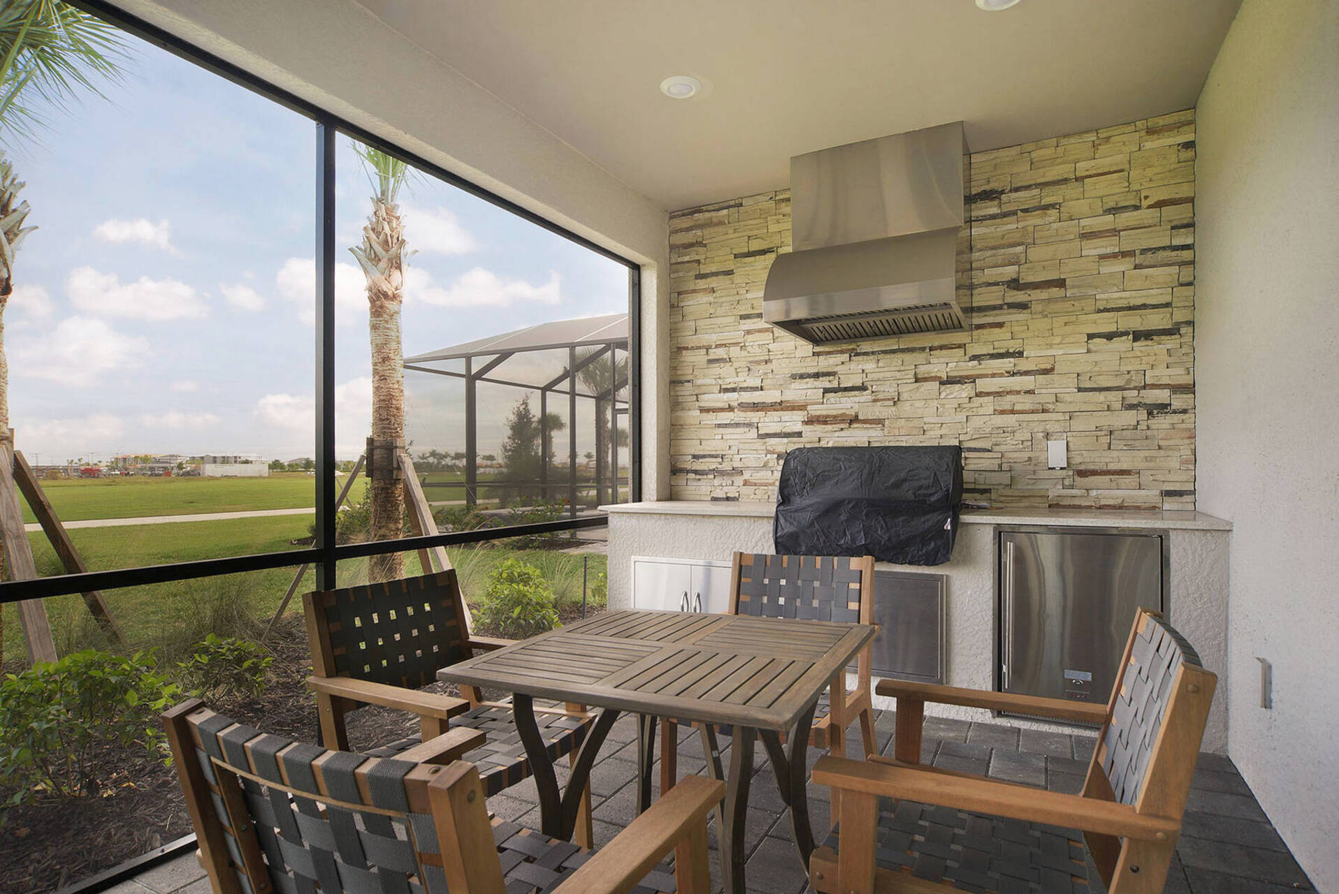 Screened inn Porch with Outdoor kitchen