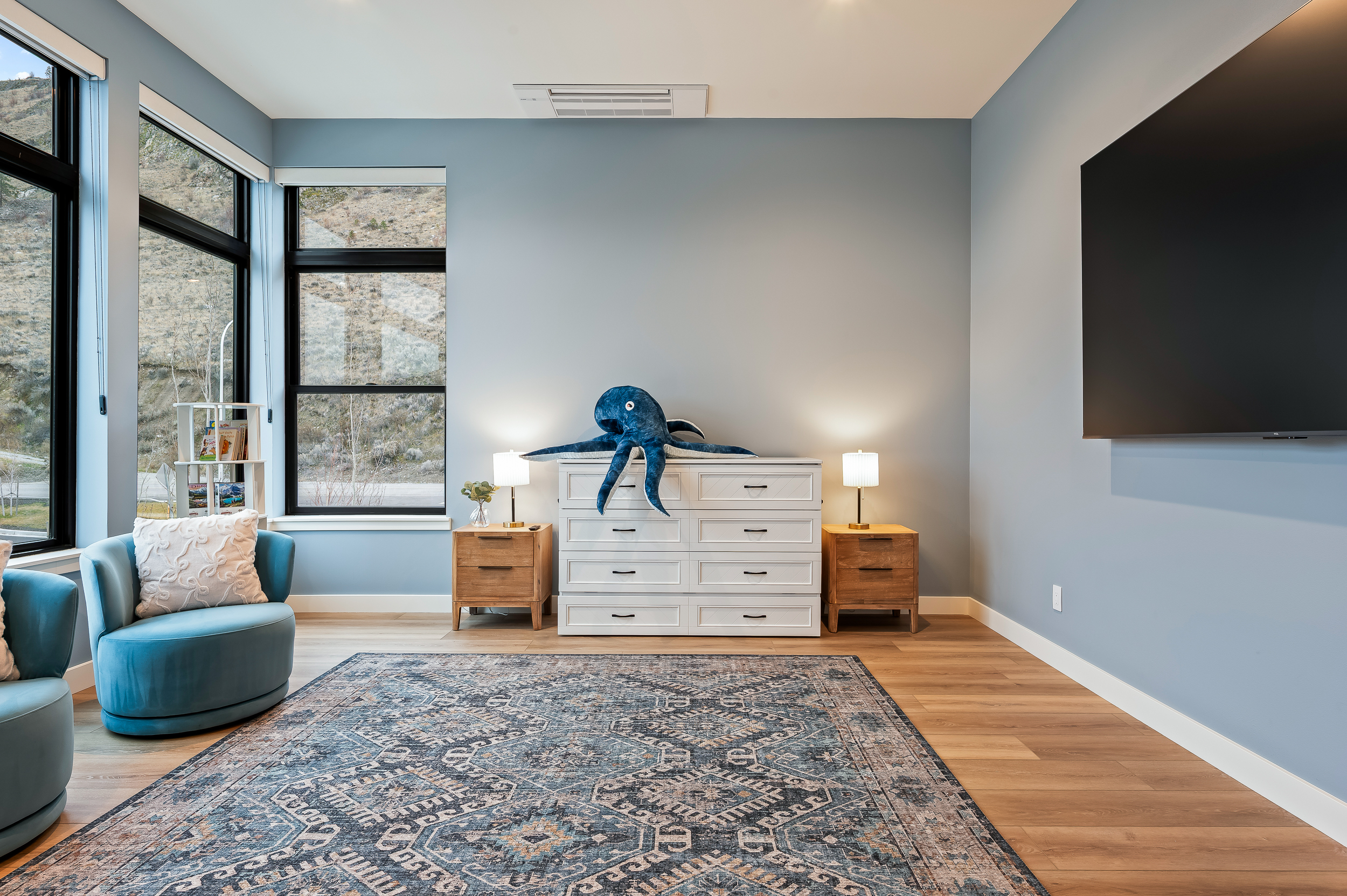 Bedroom #7 of 7 - Upstairs bonus room with queen sized Murphy pull-out bed, two twin bunks, Smart TV, and en suite with walk-in shower
