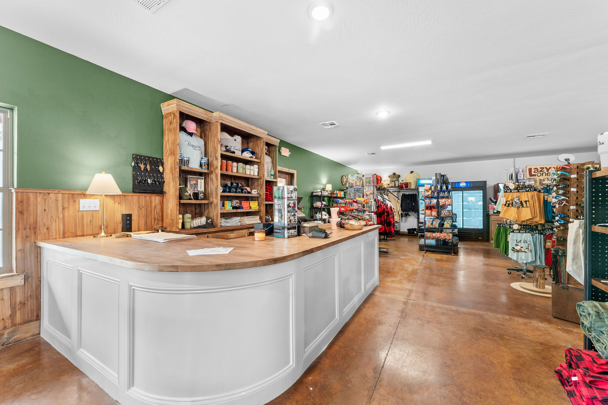 Grab Tall Timbers apparel, snacks, and camp essentials at the General Store ,  swimsuit forget-me-nots included.