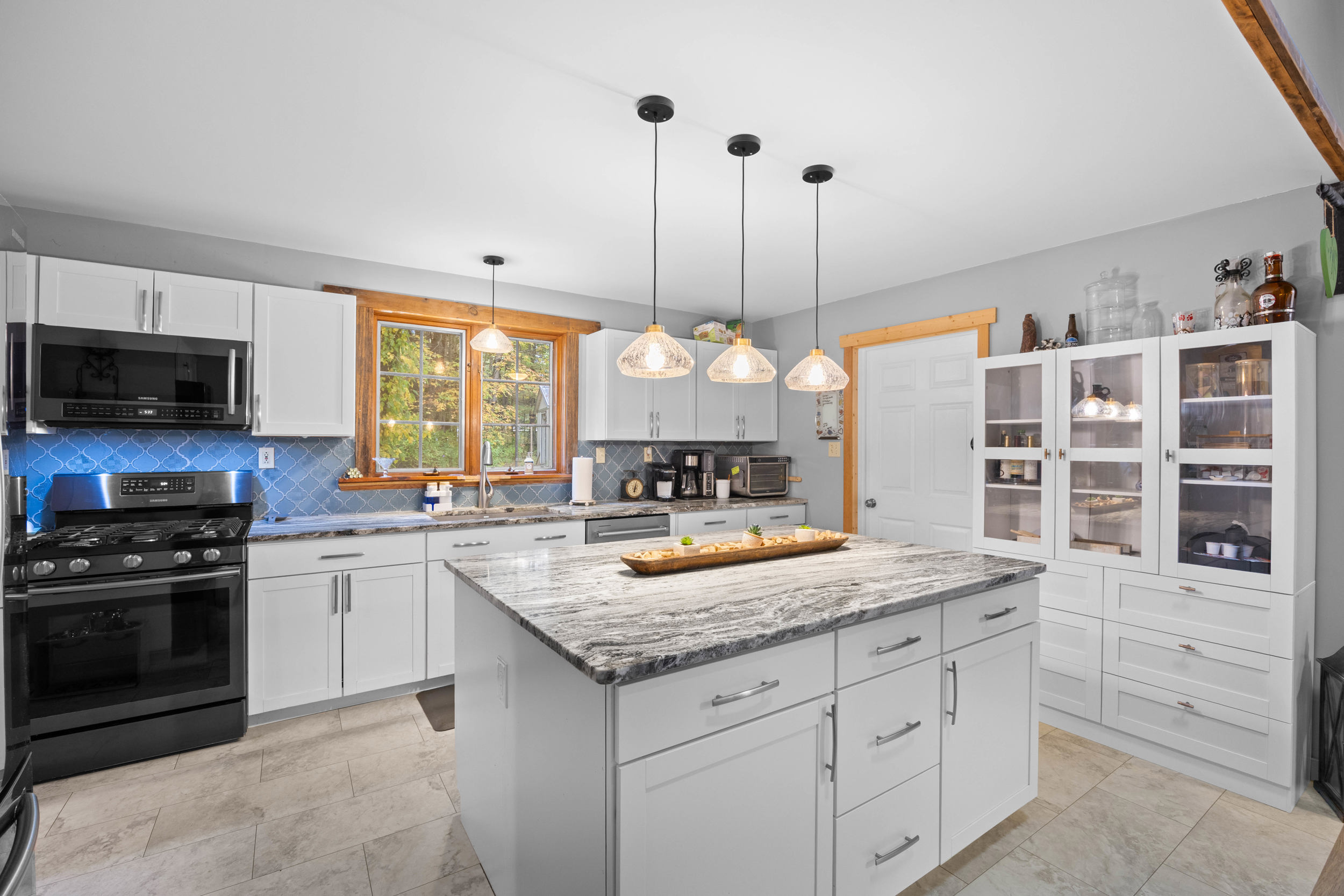 Large, well stocked kitchen is ready for your best home cooked meals.
