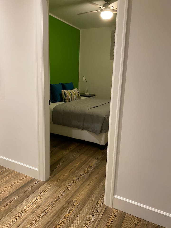 The entry way into the second bedroom with a king size bed.
