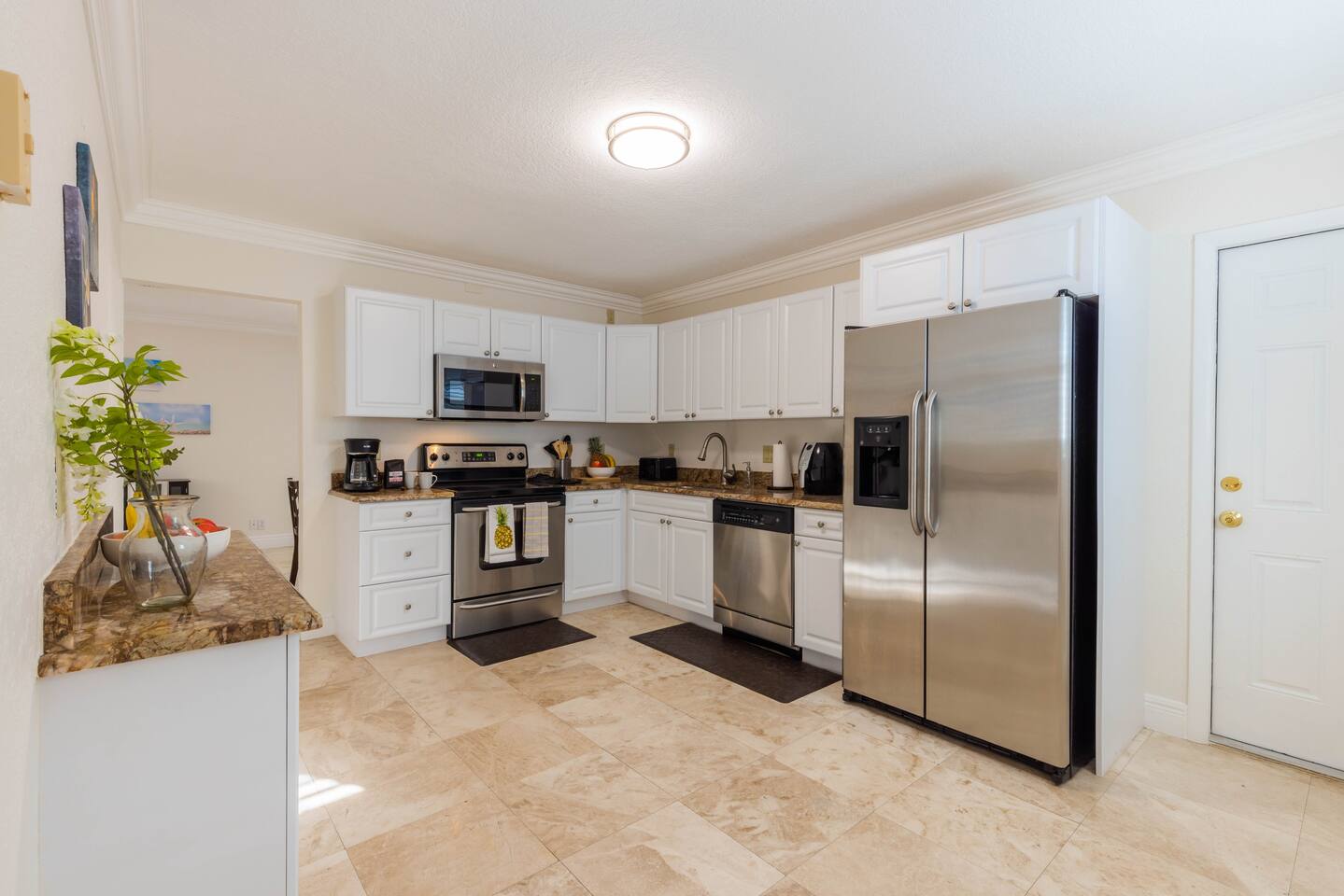 The kitchen has dinnerware, outdoor dinnerware, glasses and silverware for up to 8 guests. With plenty of counter space, you can cook up a storm for your family with easy service to the dining room.