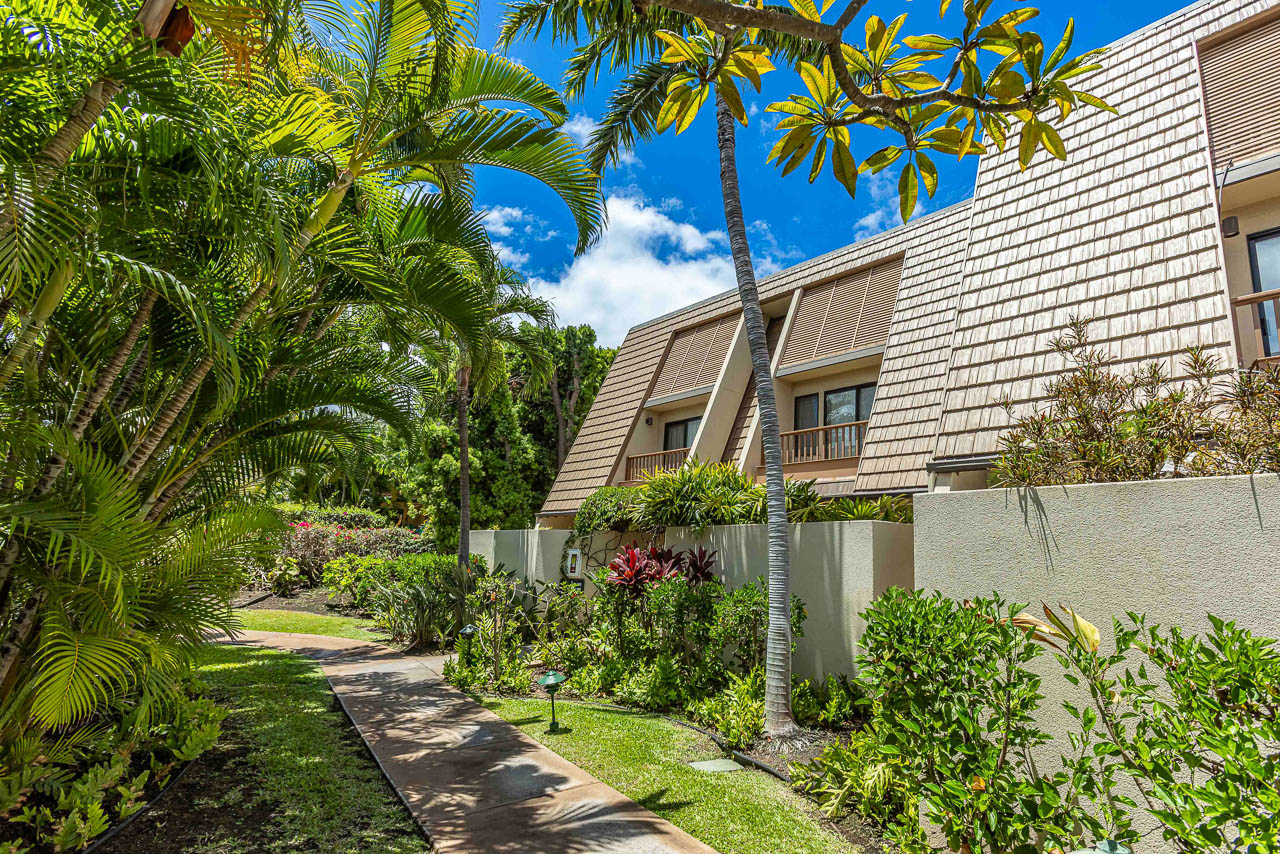 Charming architecture blends well w/tropical gardens