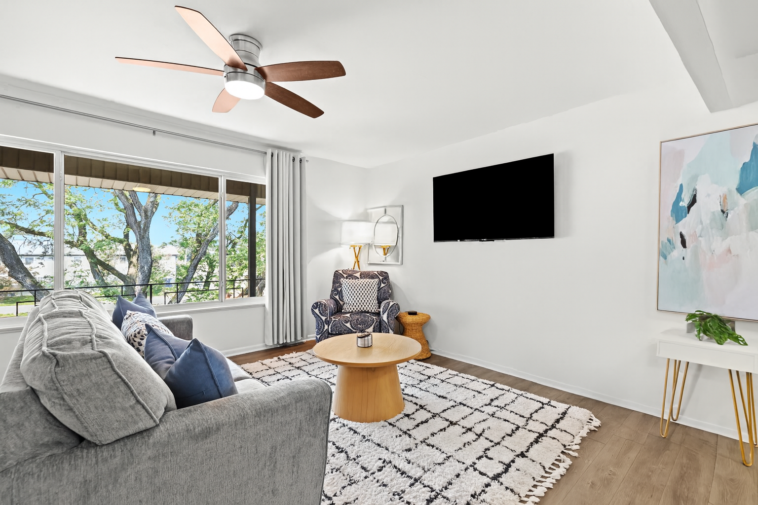 Kick back in the roomy living area—ideal for streaming your favorite shows or unwinding with loved ones.