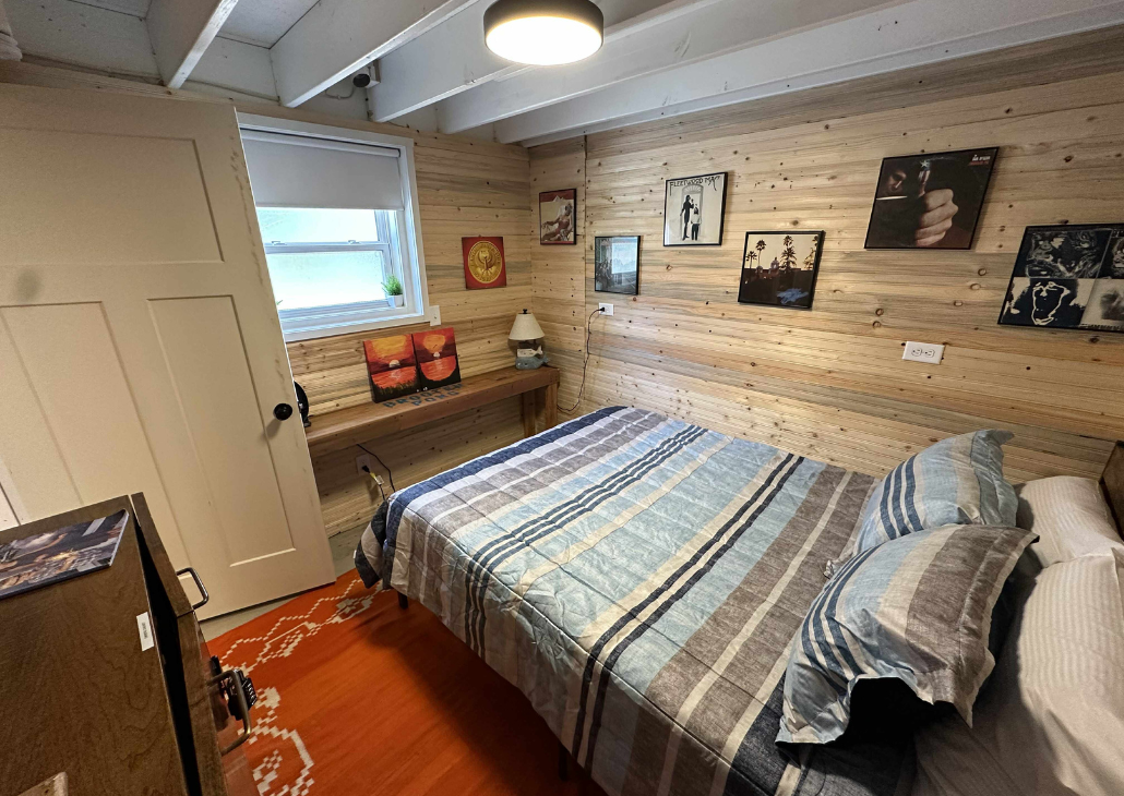 NEW queen bed in this enclosed bedroom.