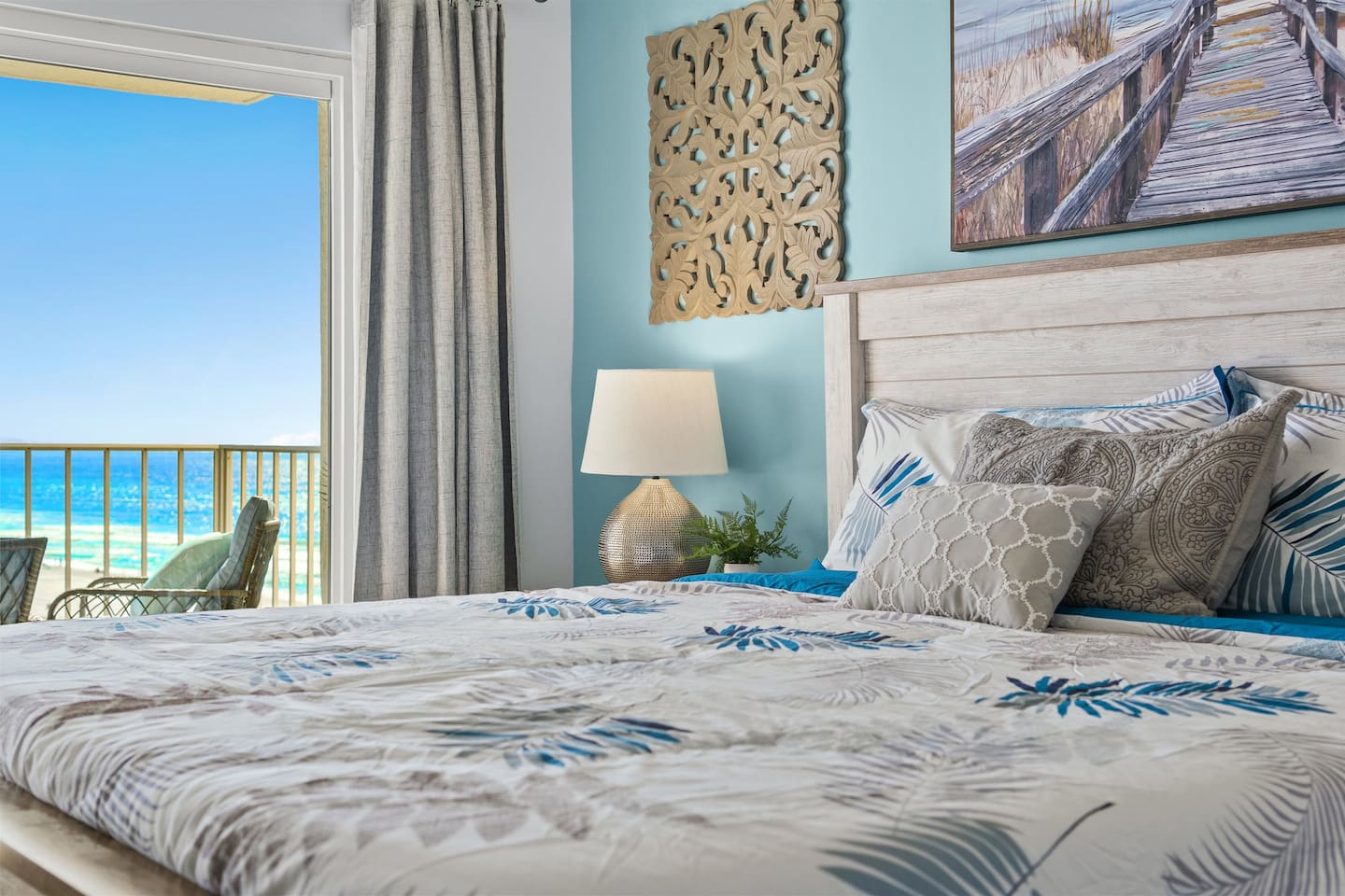 Primary bedroom with private bath and gorgeous views of the beach!