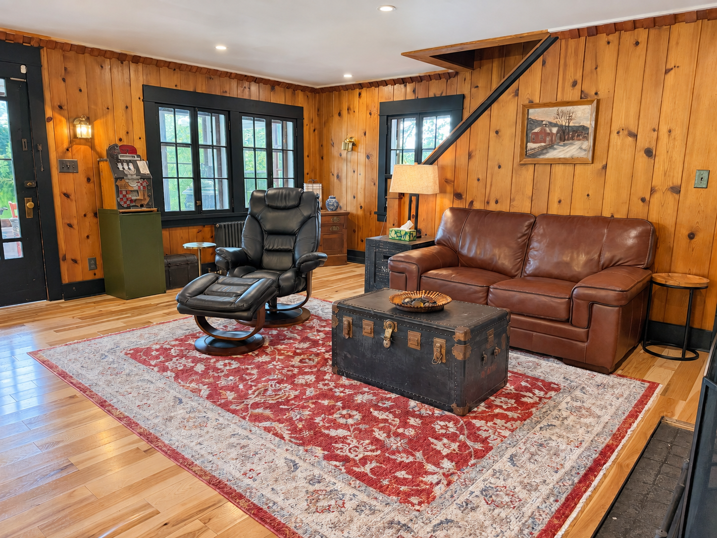 Lounging area with original fireplace.