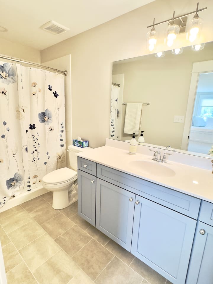 Of course, the hydrangea king suite has an adorable en suite full bath also with a floral pattern also done in soothing blues and grays. Every detail is well thought out at Blueberry Bay.