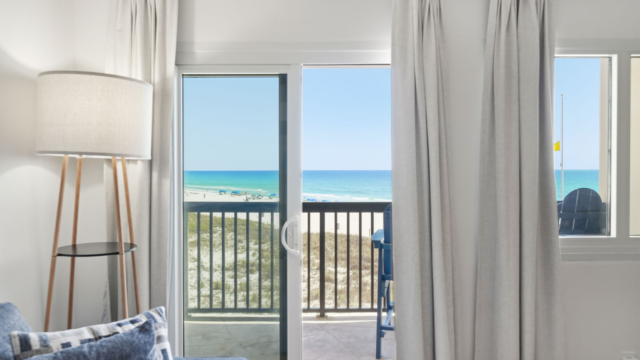 Living room walkout to beachfront balcony