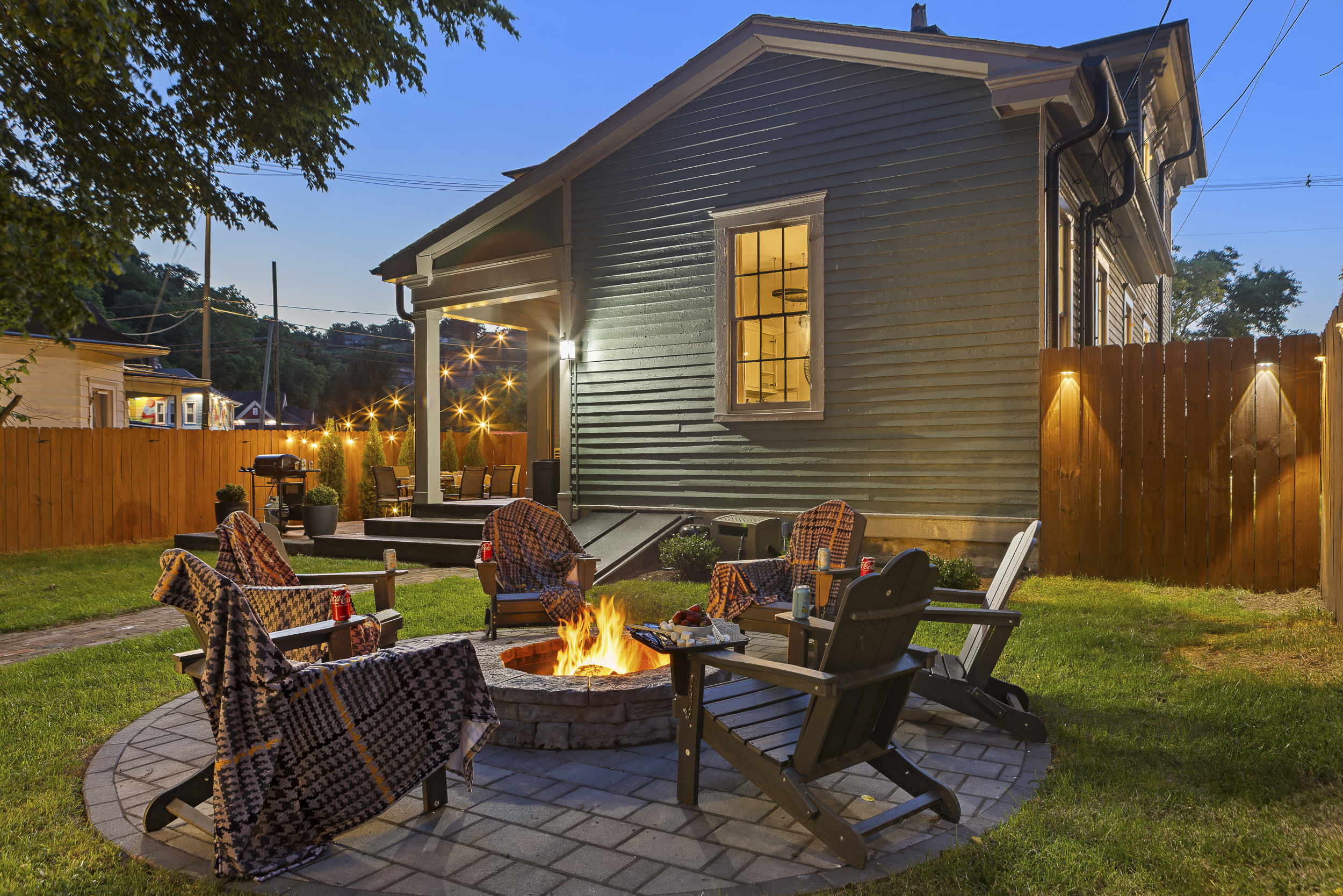 Cozy up around the fire pit with blankets and drinks, where there's plenty of room for the whole crew to gather.