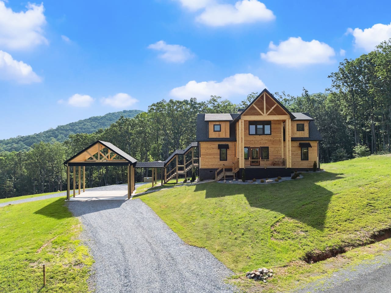 Welcome to your luxury mountaintop getaway featuring a custom-built cabin and spacious covered parking.