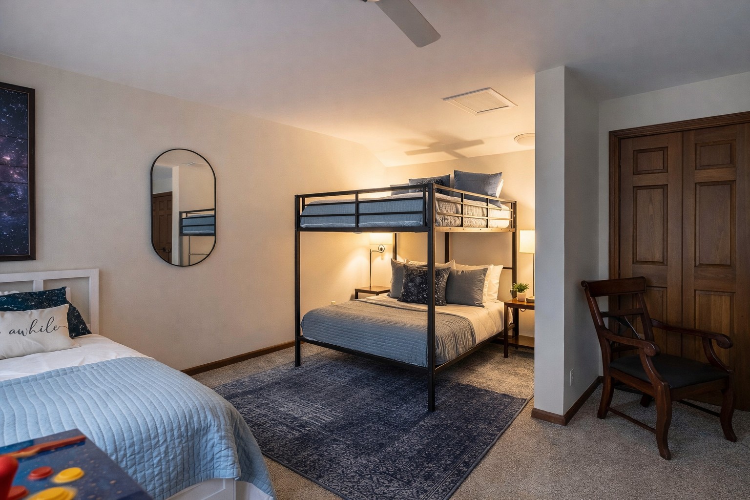 Spacious queen-over-queen bunk beds offer both comfort and fun in the ultimate kid (or teen!) hangout zone.