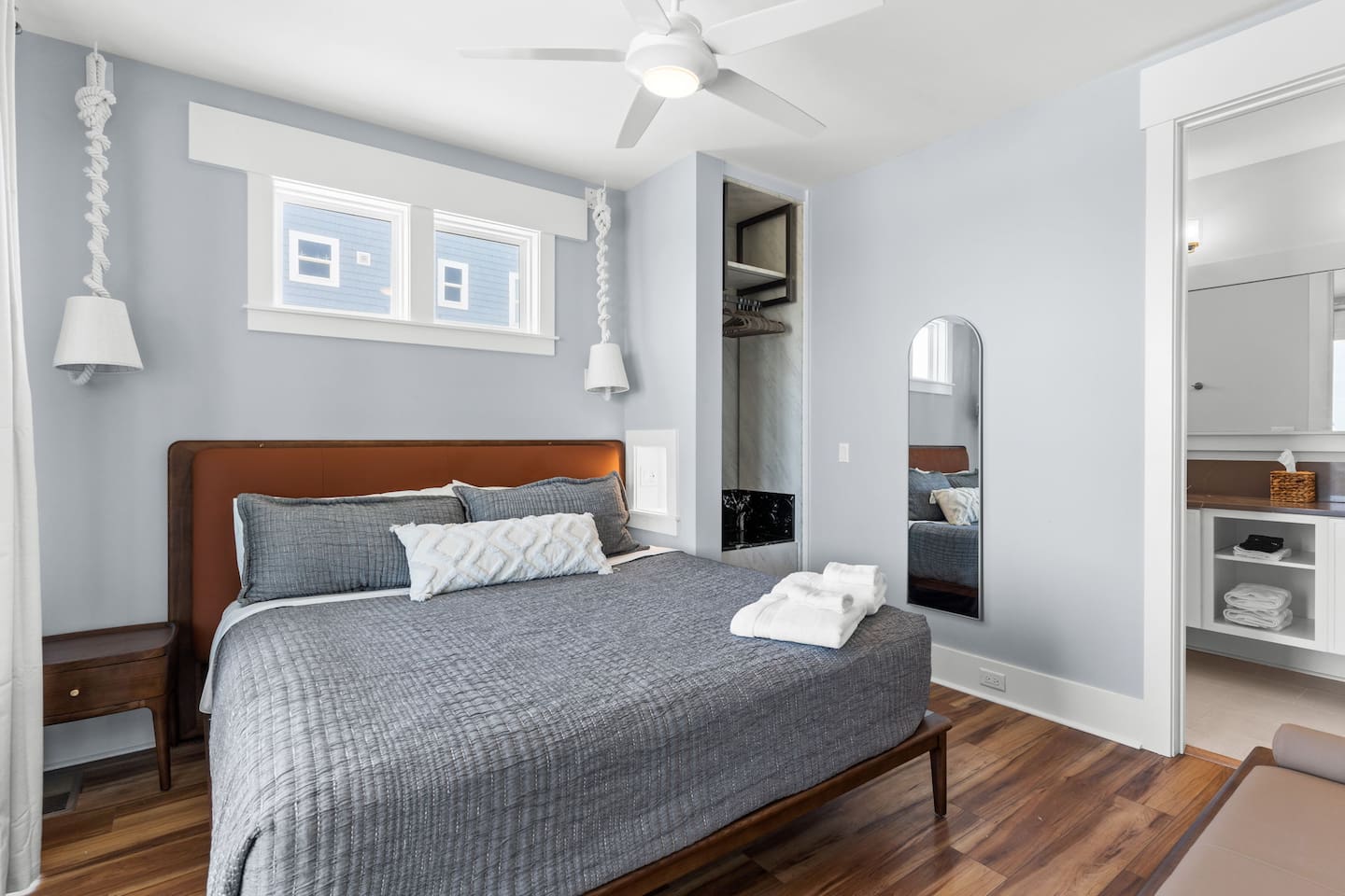 This king suite offers direct access to the main oceanfront porch. Step through the sliding glass doors to enjoy fresh coastal breezes, beautiful views, and a quiet spot to start or end your day.