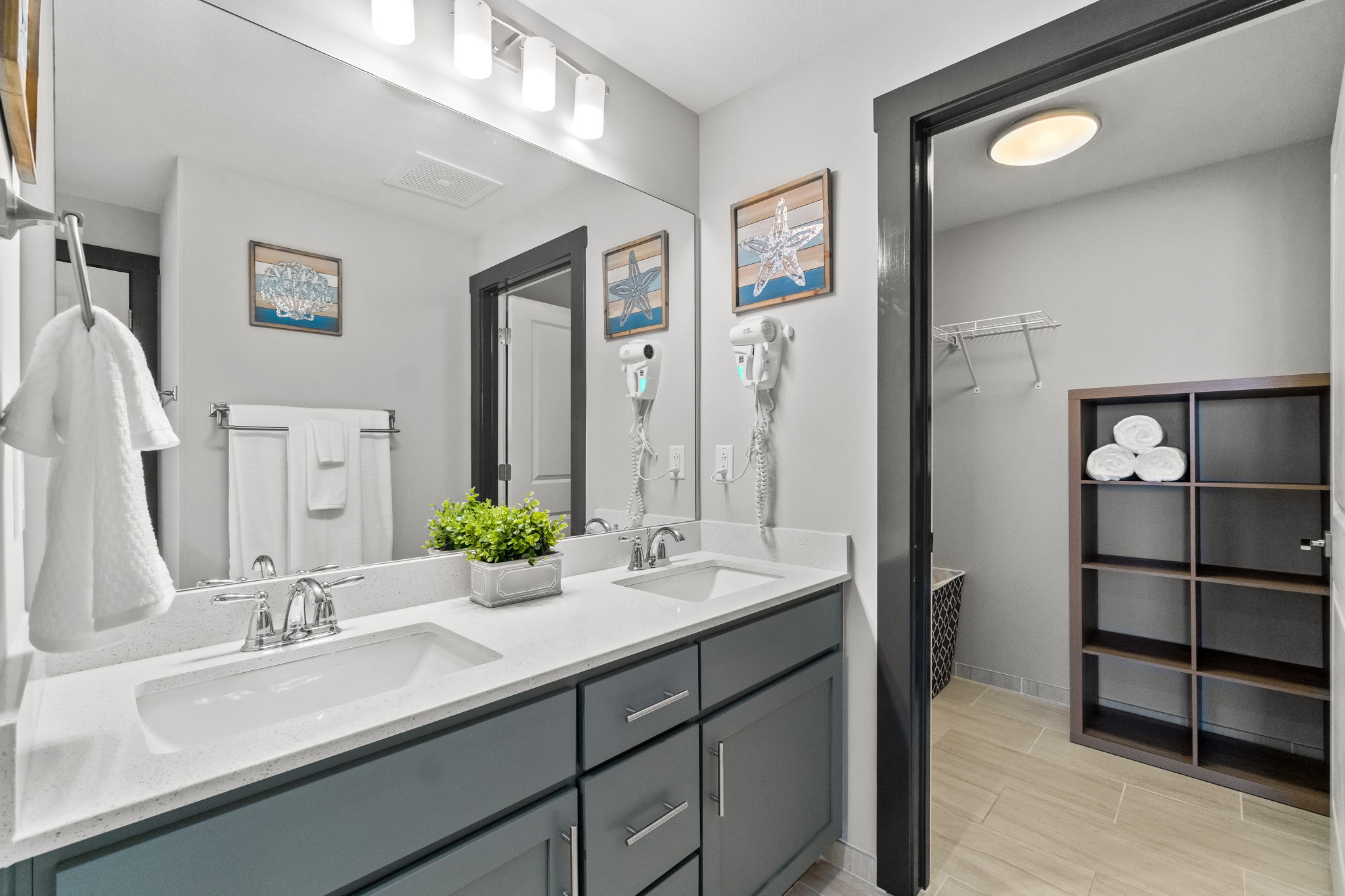 Master bathroom with double vanities, walk-in clos