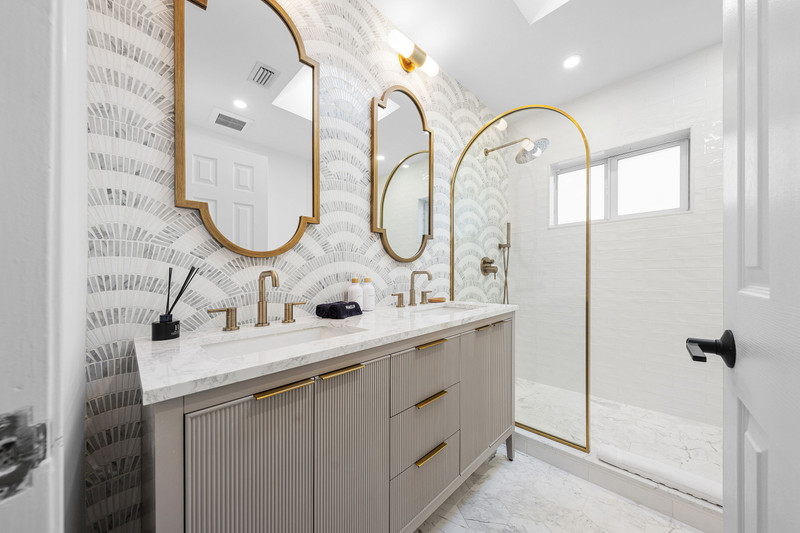 This is the updated bathroom. Professional photos with the installed cabinet doors will be uploaded soon.