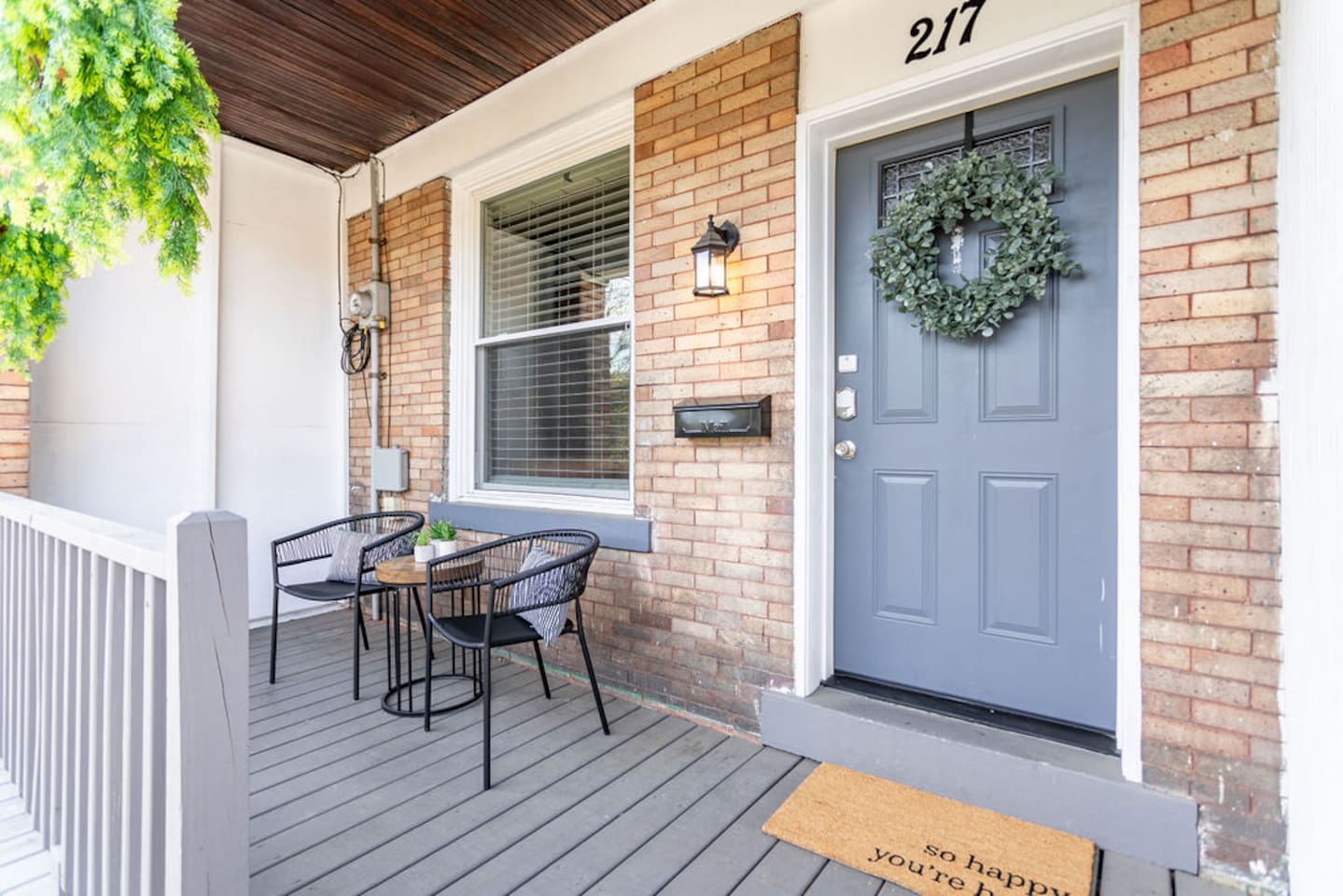 Inviting entrance patio leading to a charming front door, welcoming you to your home away from home.