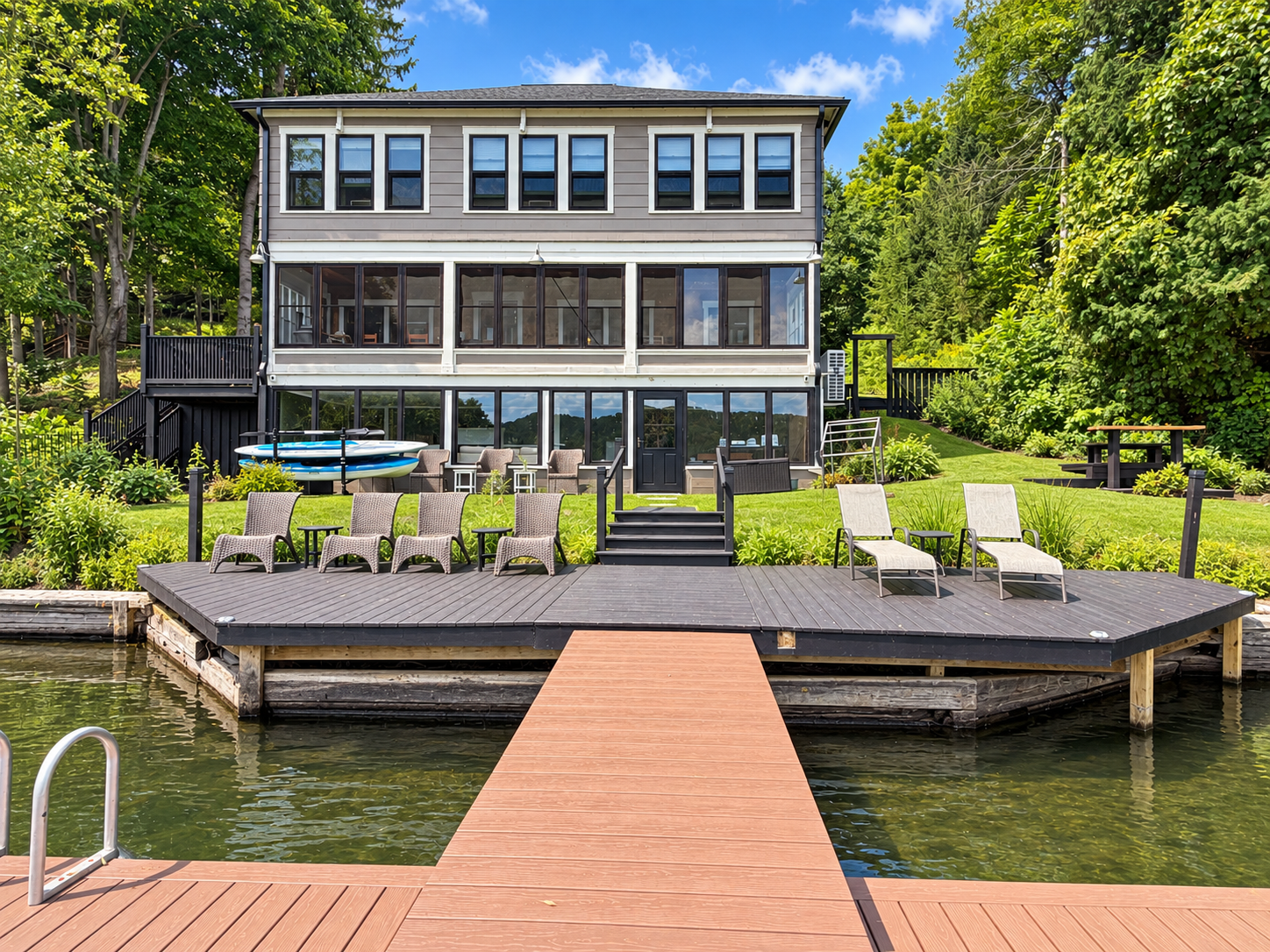 Goodyear Lodge facing the water, look at all those windows! Enjoy views of the lake from almost every room in the house.