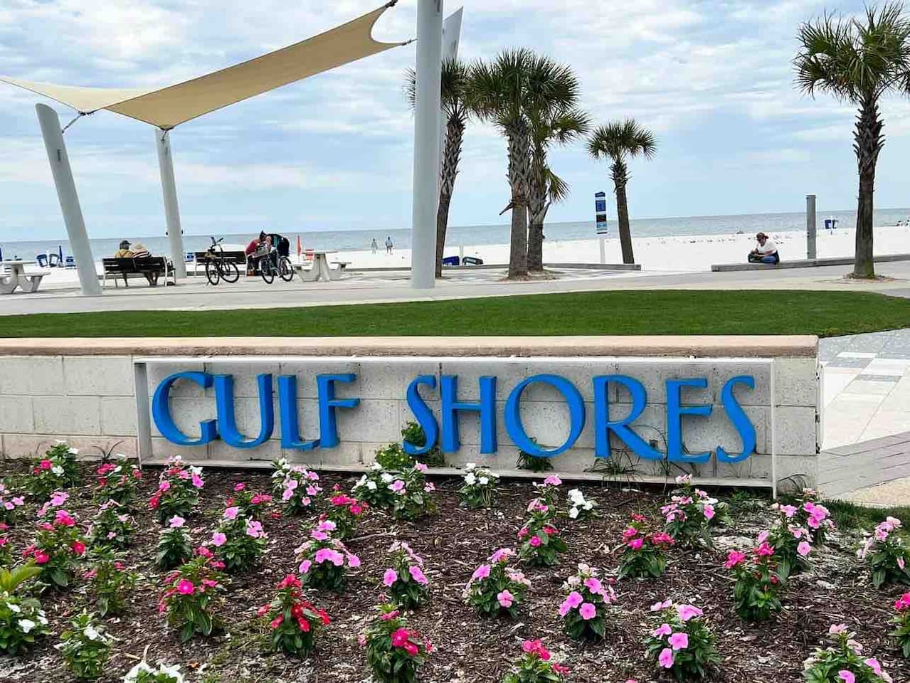 Gulf Shores, Alabama, welcomes you with stunning flowers, palm trees, and ocean breezes.