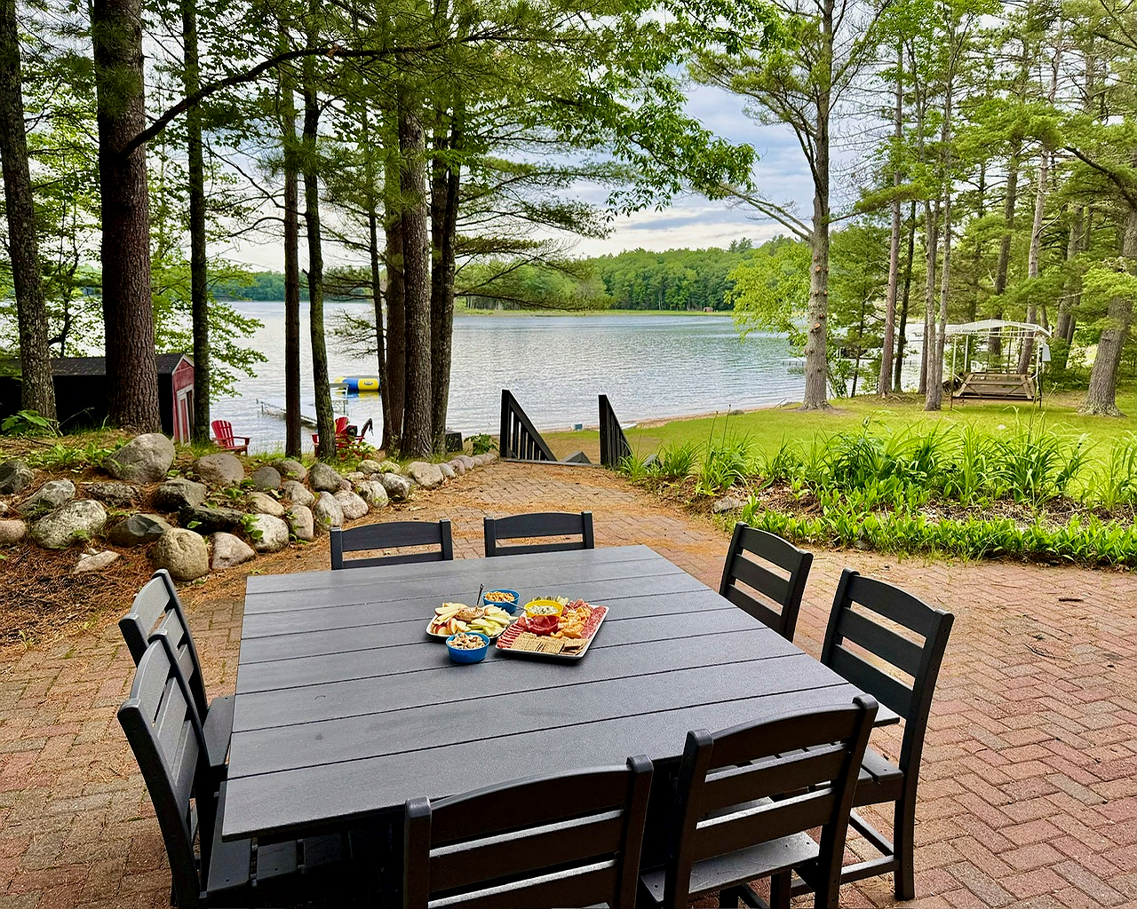 Relax and enjoy a meal or snacks on our patio overlooking the lake and yard
