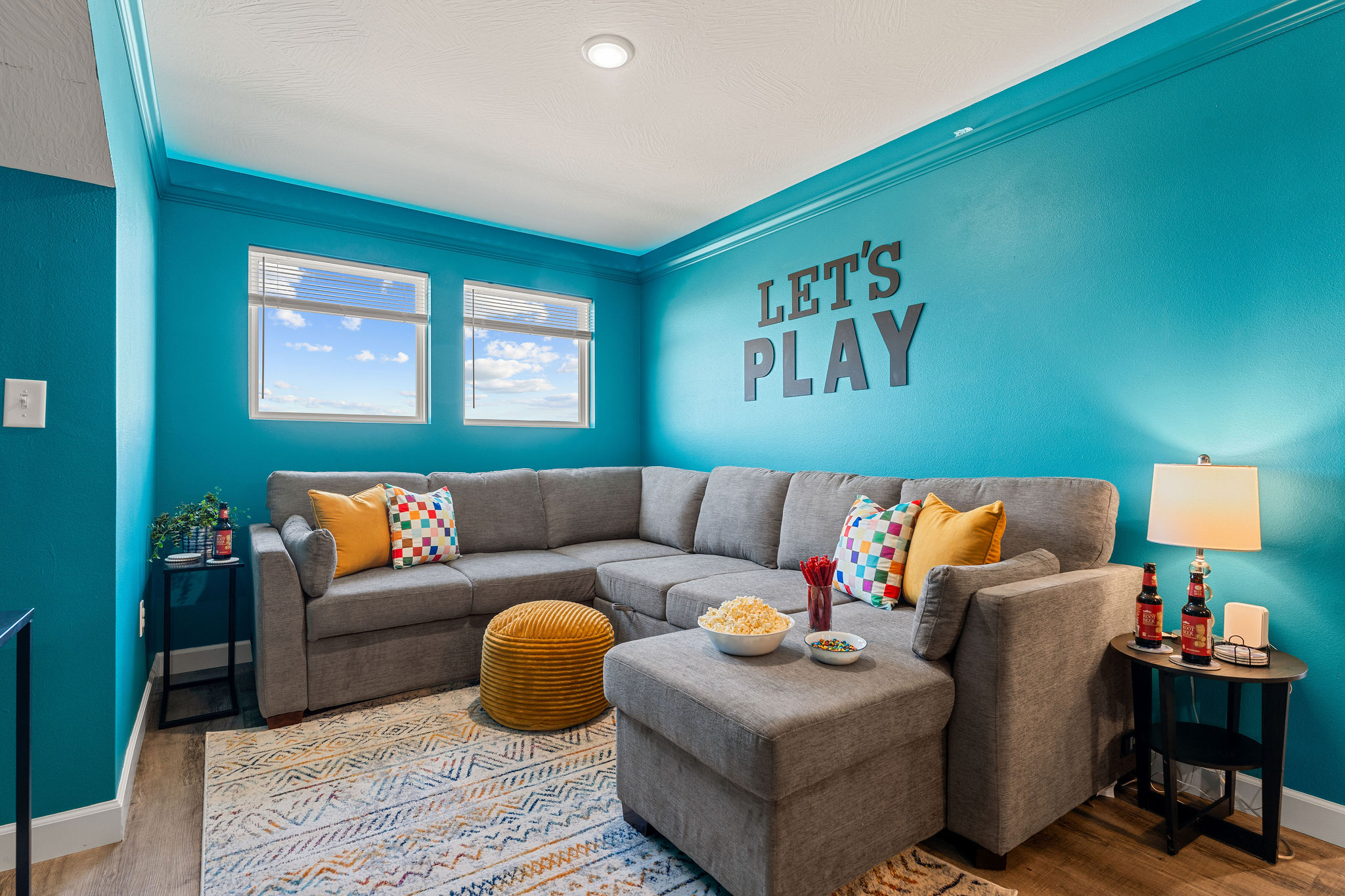 Second floor game room and family room have surround multi-color LED lighting