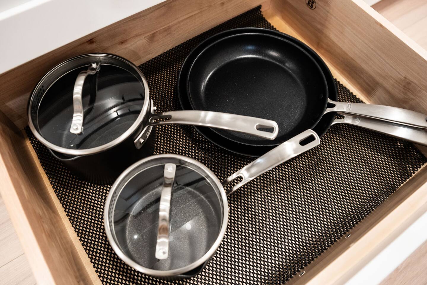 Pots and pans for cooking meals in.