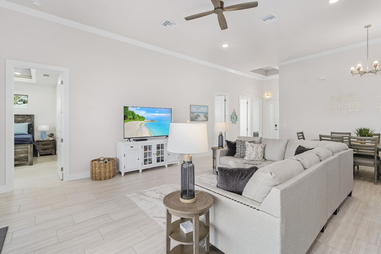 Spacious living area with cozy seating, ideal for movie nights.