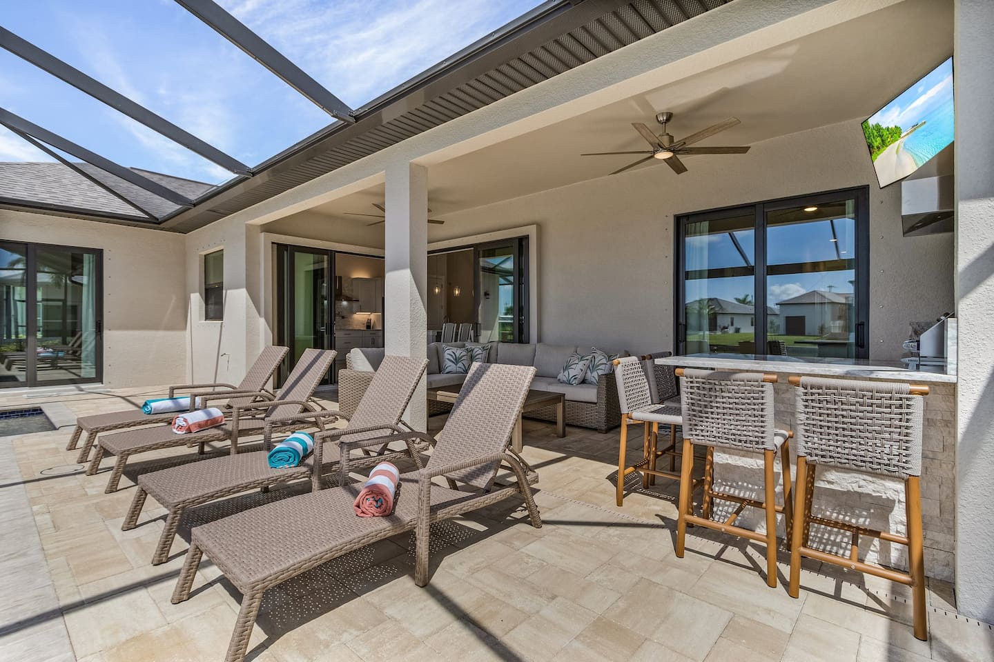 A vibrant outdoor entertainment area, ideal for BBQs, lounging, cocktails, and creating lasting memories!