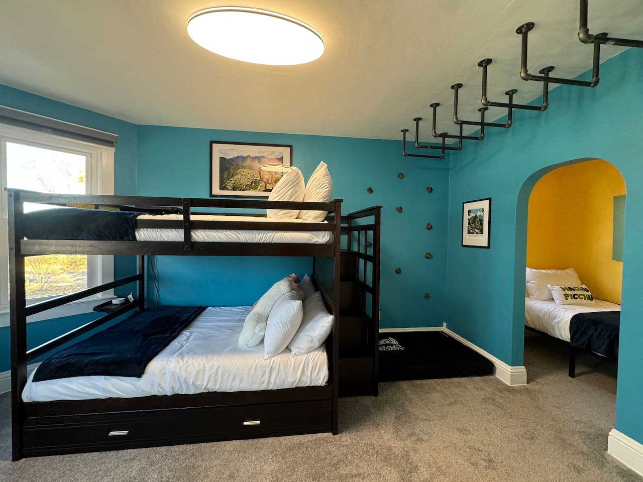 The Machu Picchu Bunk Room is ideal for kids, teens, and families. This Upper Level room sleeps up to 6 people in a Full over Full size bunkbed with a twin trundle bed that pulls out and separate twin bed in its own alcove.