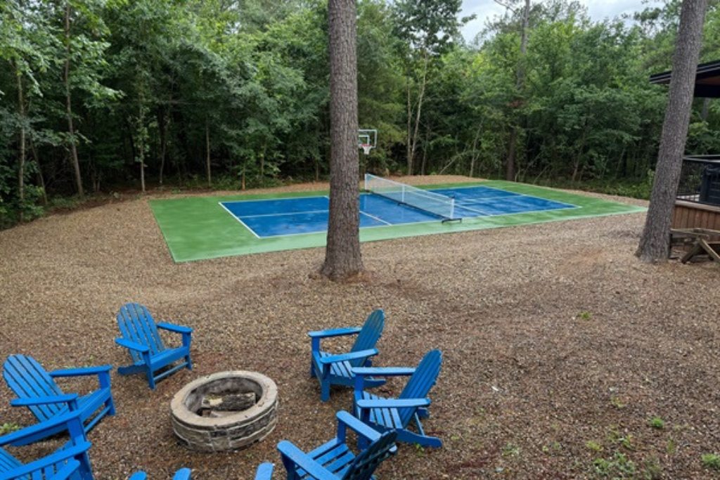 Brand-new private sport court — shoot hoops or enjoy a game of pickleball surrounded by nature!