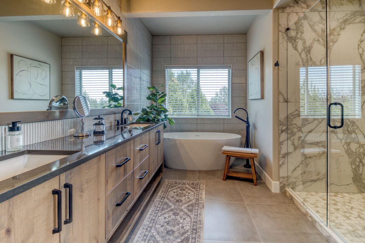 Luxury at its finest with double sinks, soaking tub and glass walk-in shower.