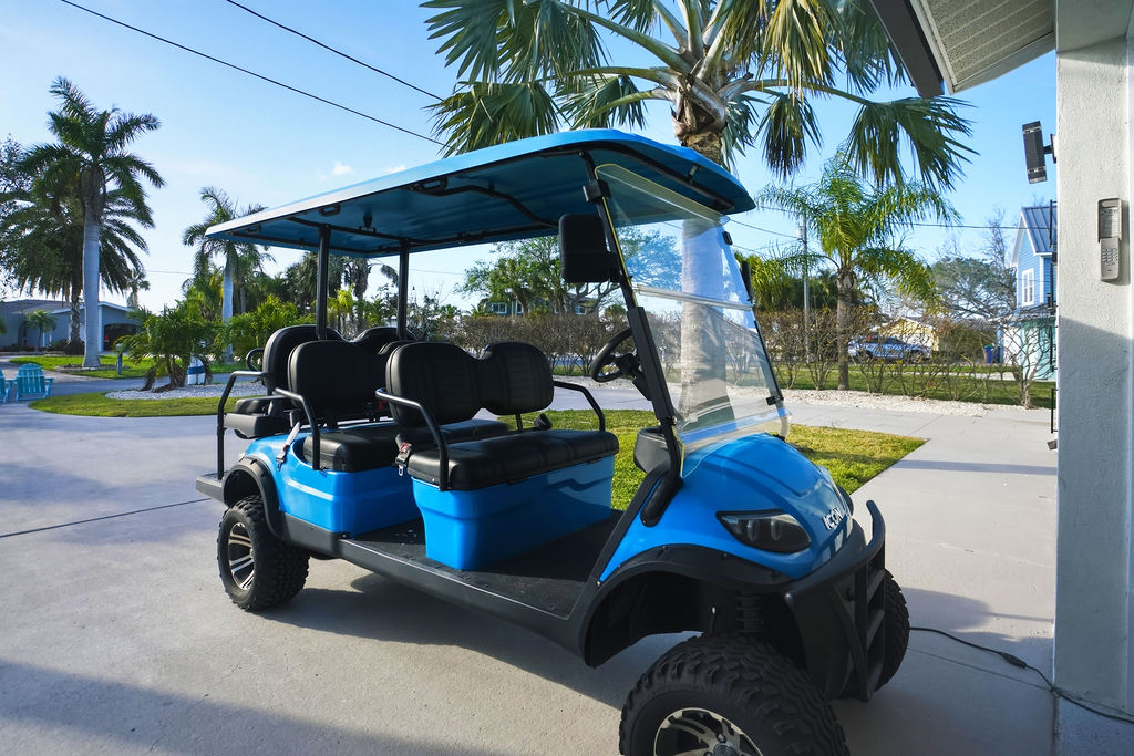 Hop aboard the Yacht Club’s  person golf cart and cruise the island like a true local captain.