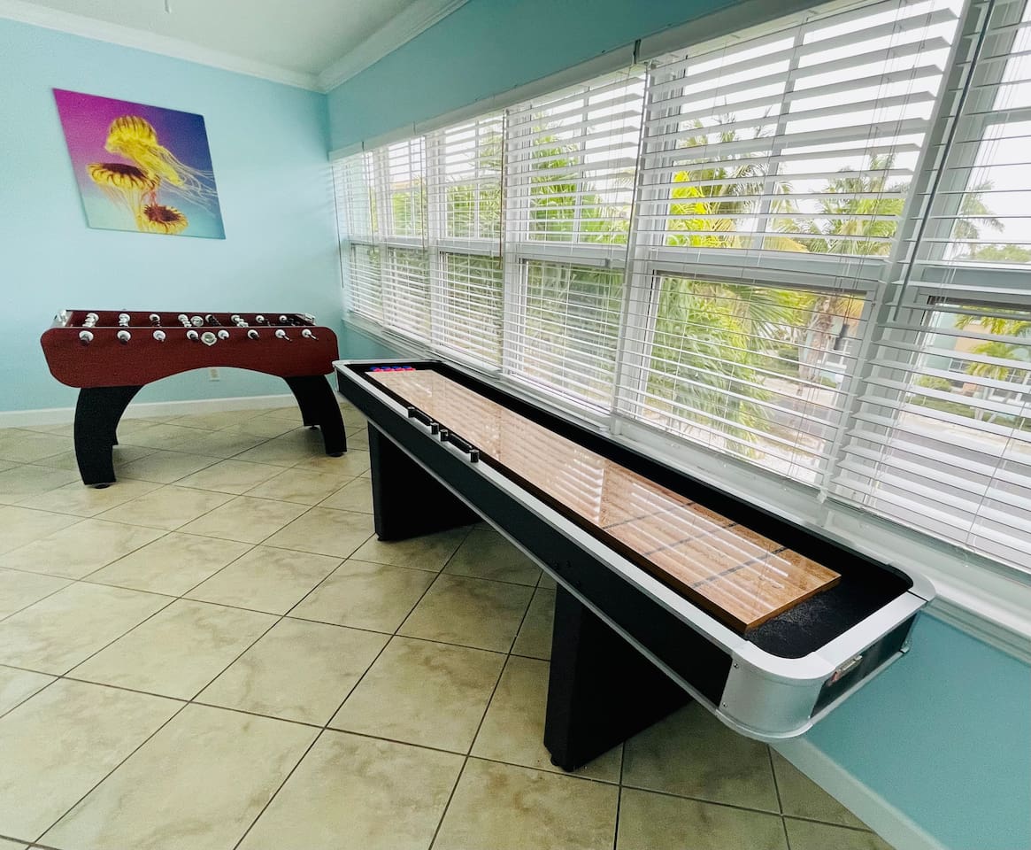 Game Room with Shuffleboard & Foosball Table