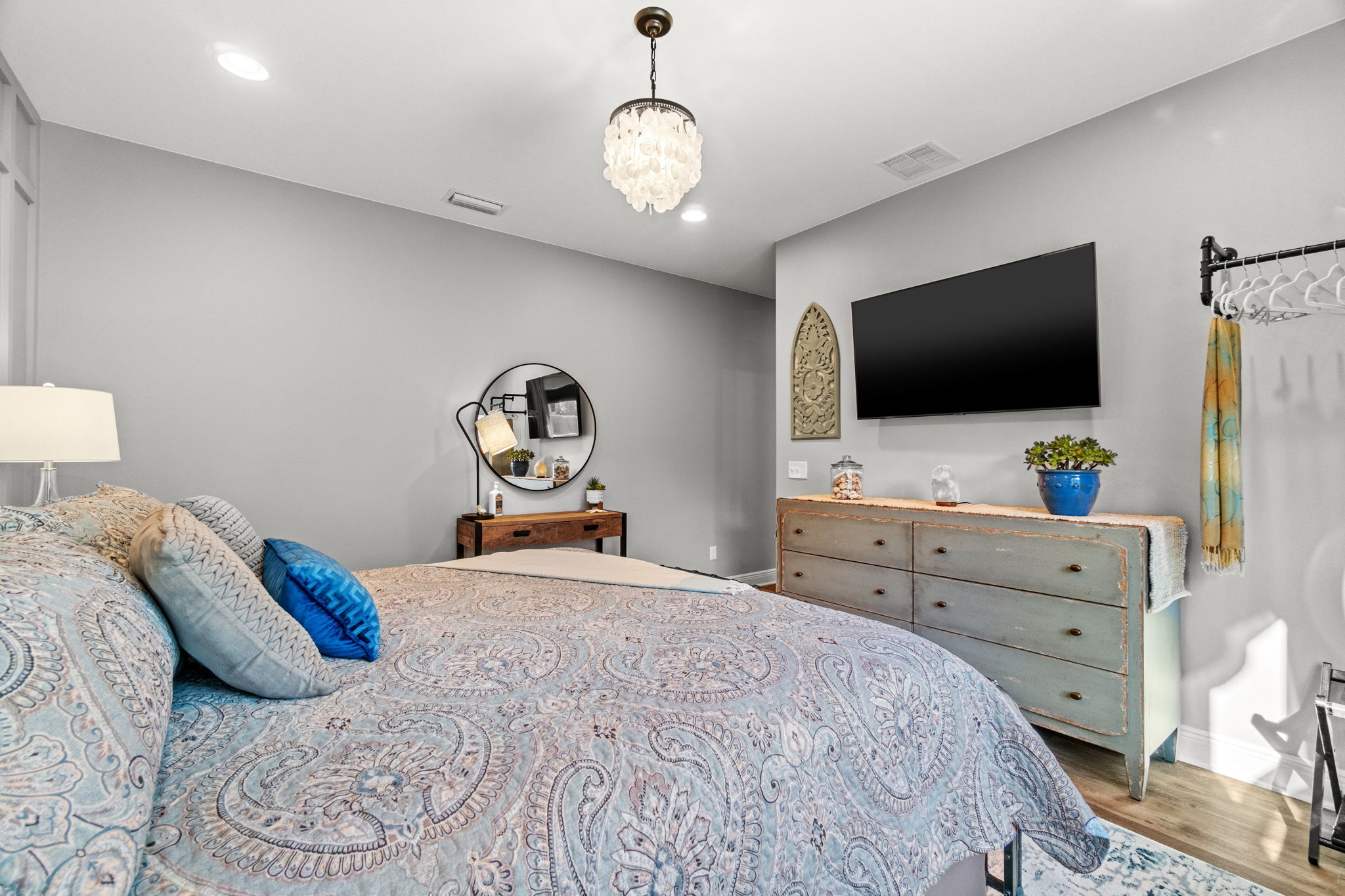 Custom closet area next to large dresser to store all your things!