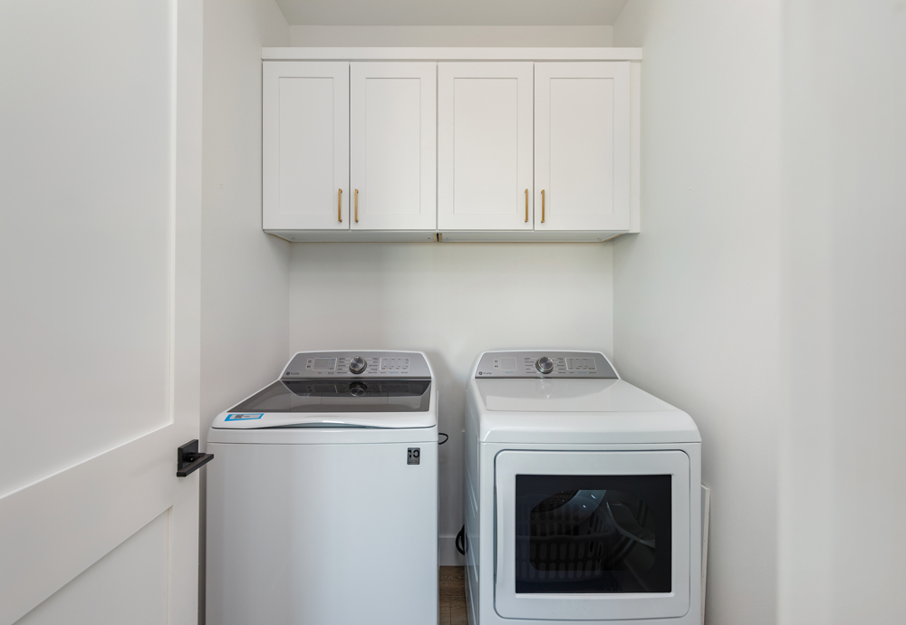 Upstairs laundry room with detergent 