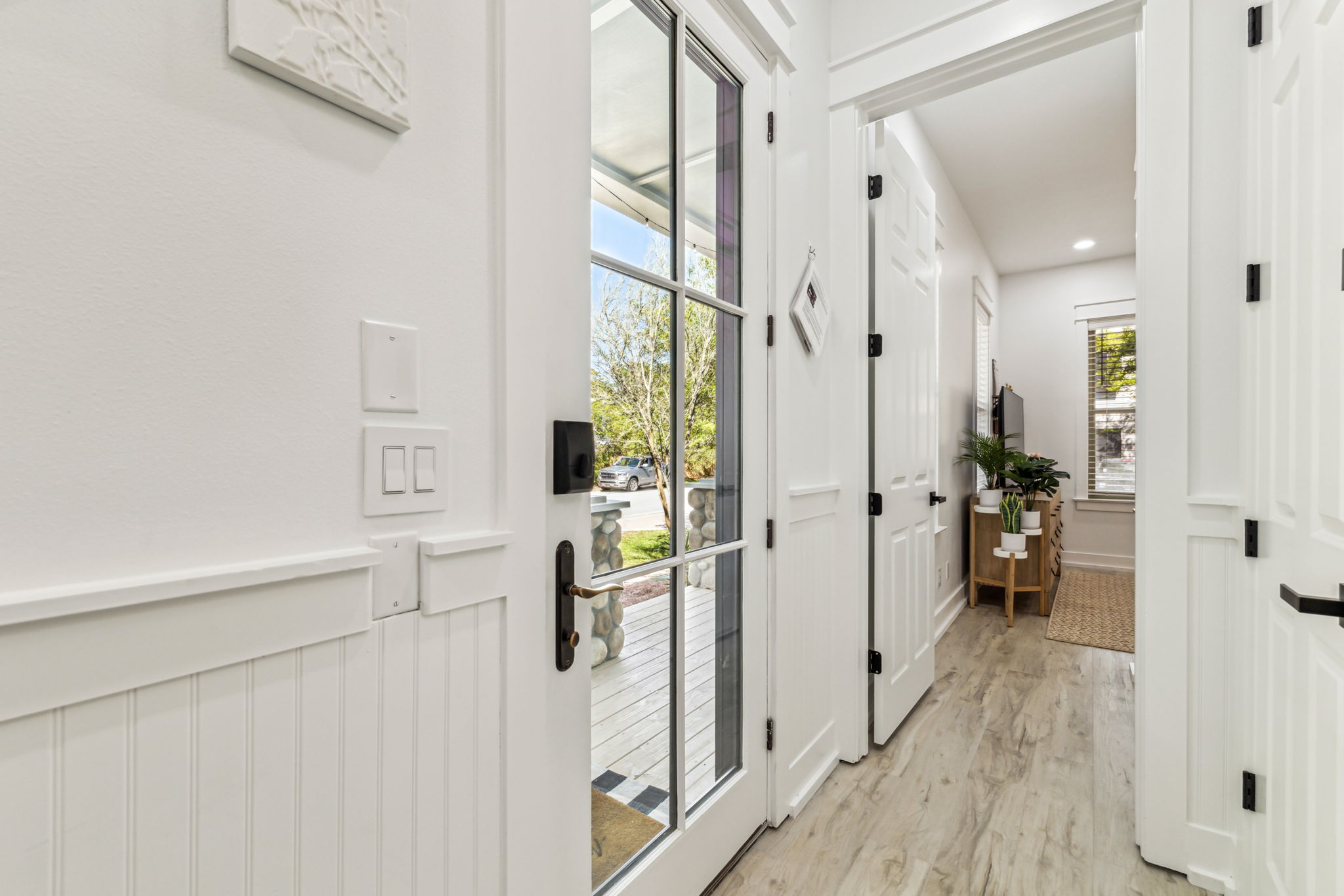 Main entrance from the inside with required short term rental postings