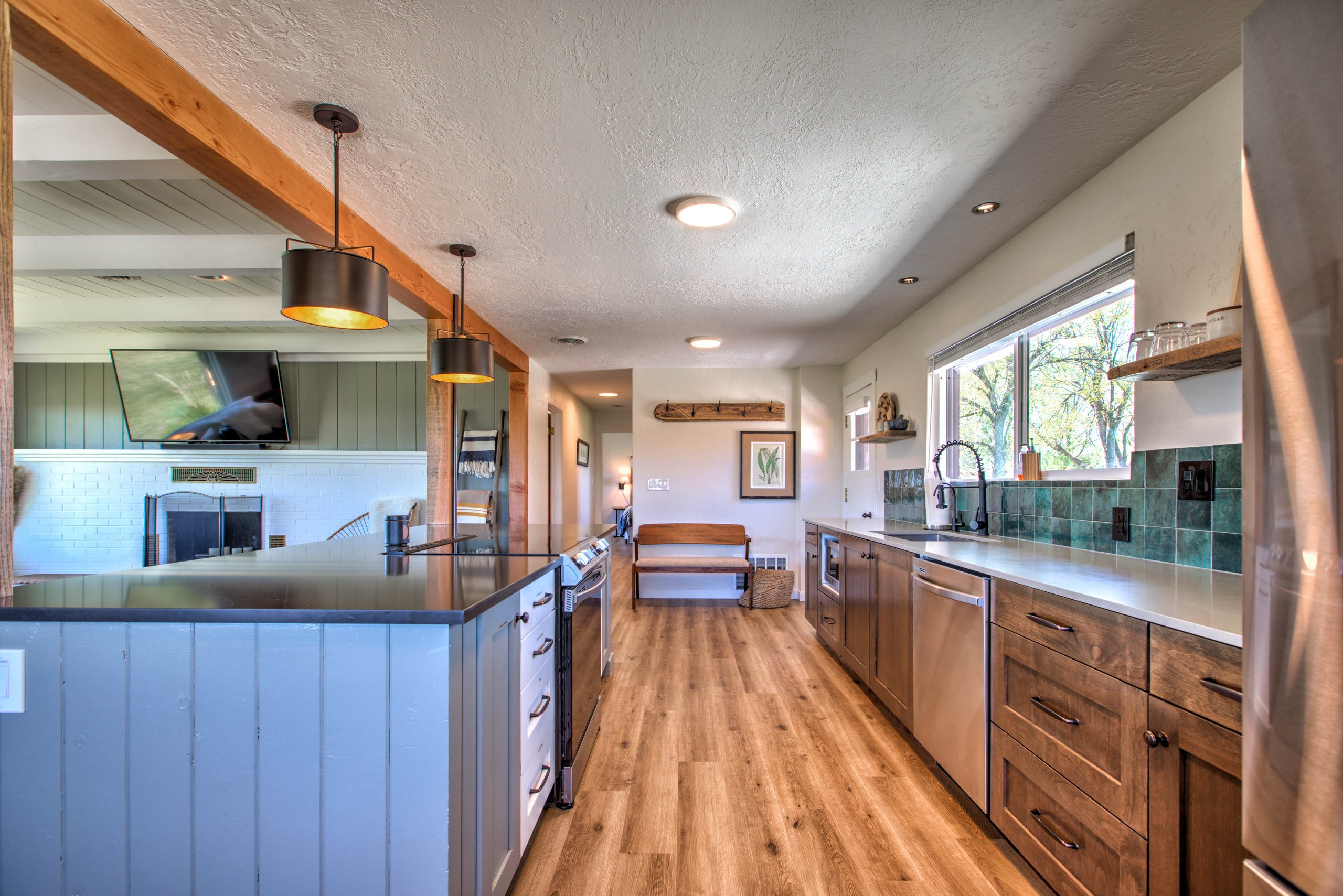 The open living-kitchen flow that makes Unit 2 feel spacious